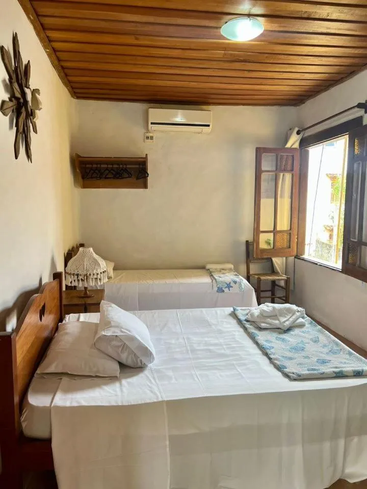 Photo of the whole room, Bed in Pousada Refugium