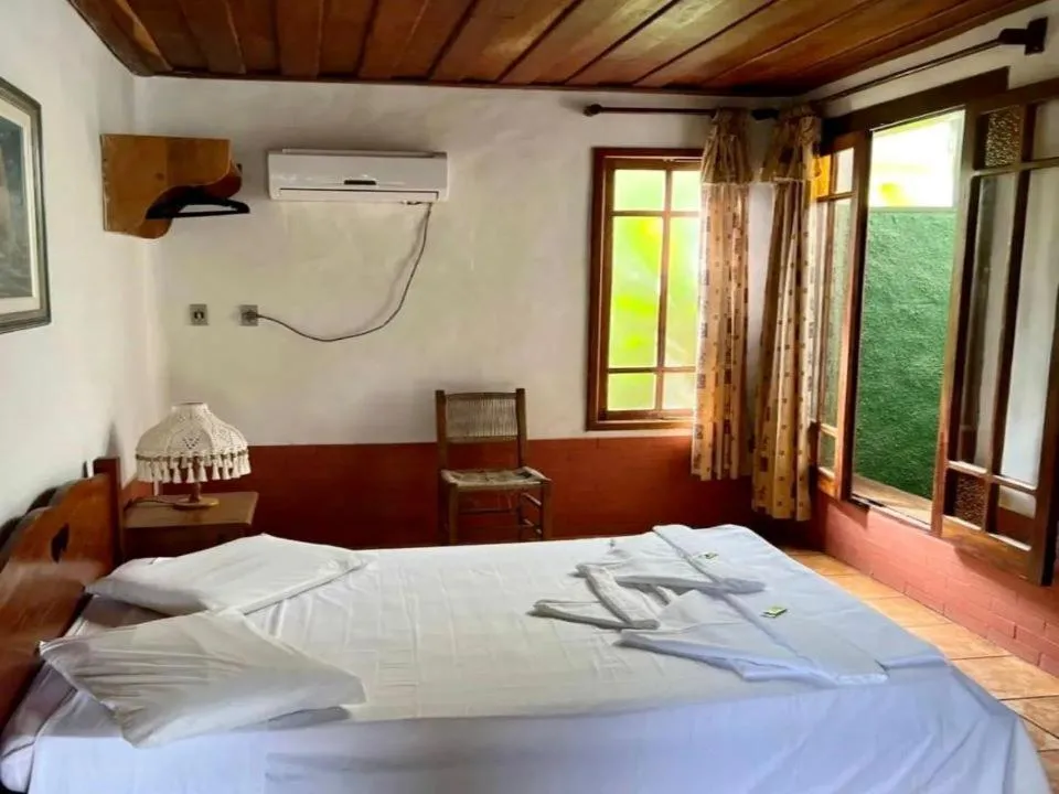 Photo of the whole room, Bed in Pousada Refugium