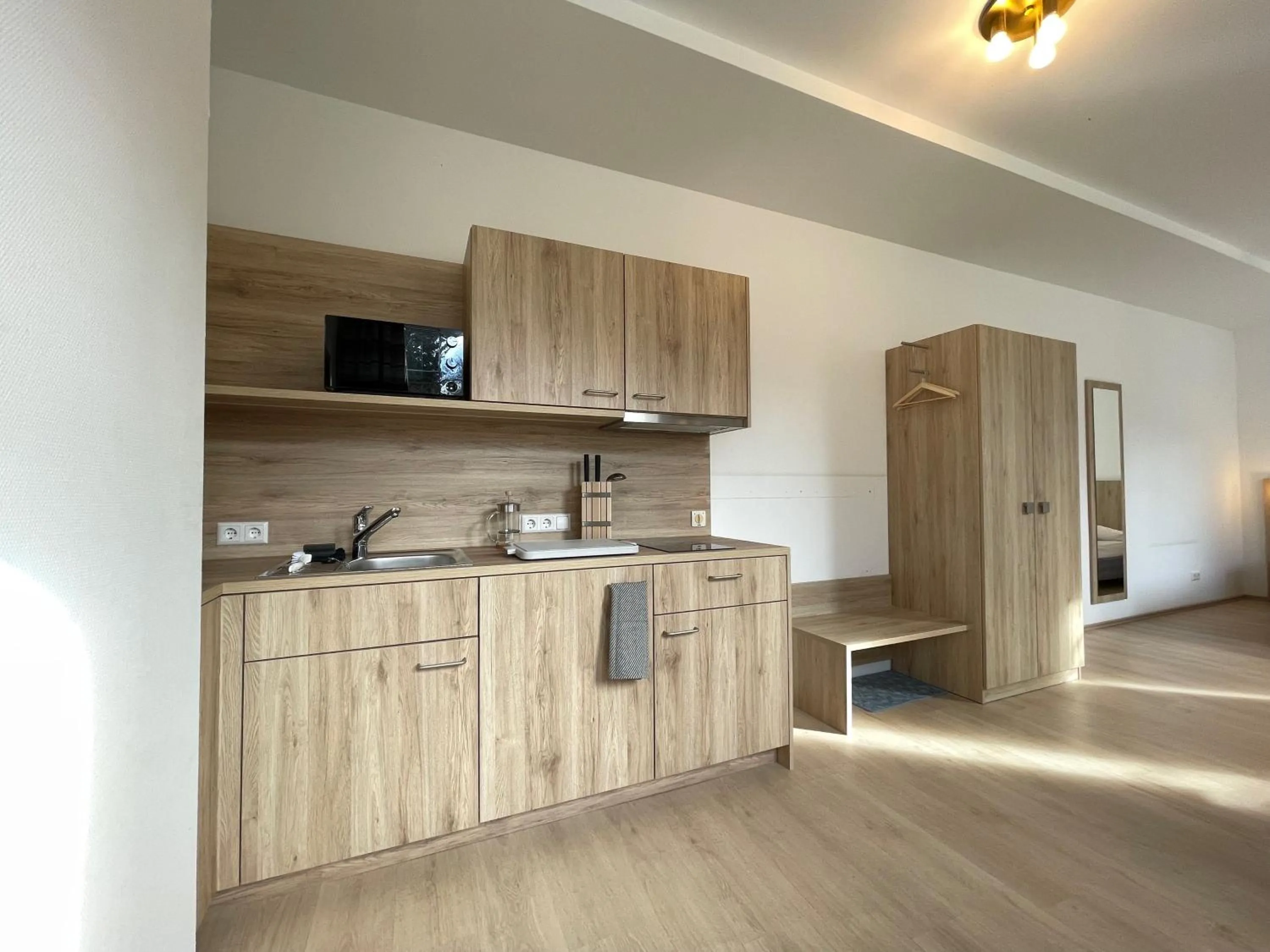 Kitchen or kitchenette in Hotel am Römerplatz