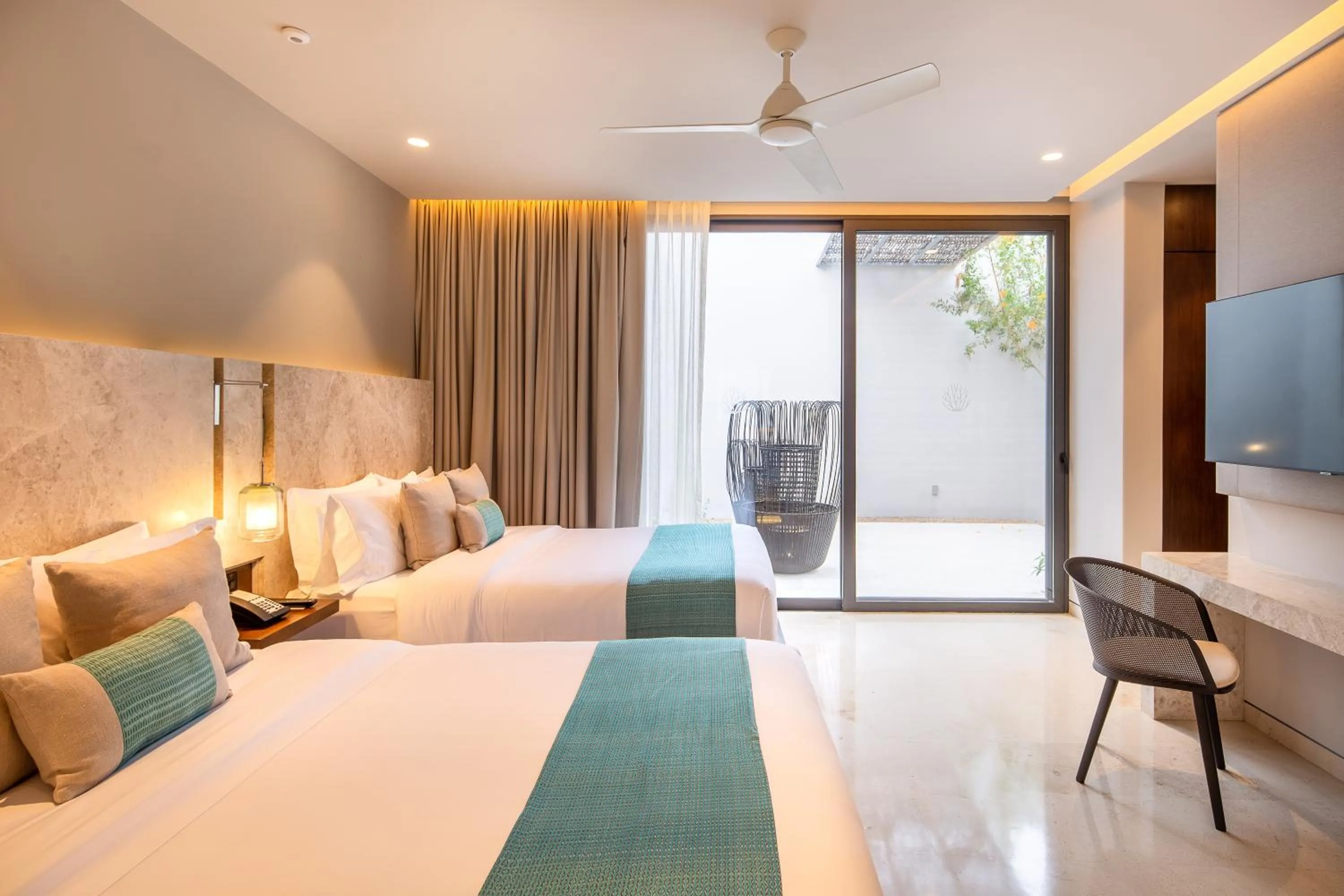 Bed in The Club at Solaz Luxury Villas