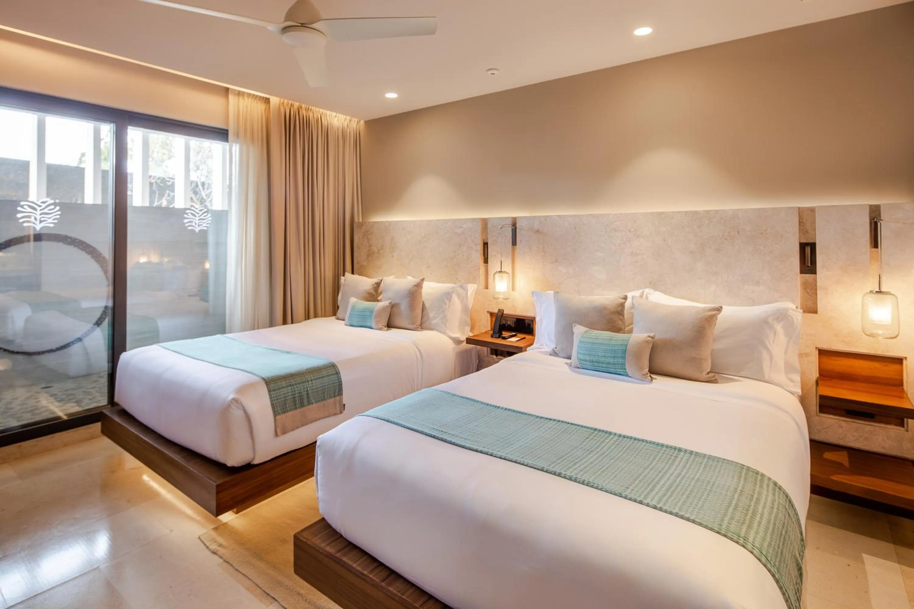 Bed in The Club at Solaz Luxury Villas
