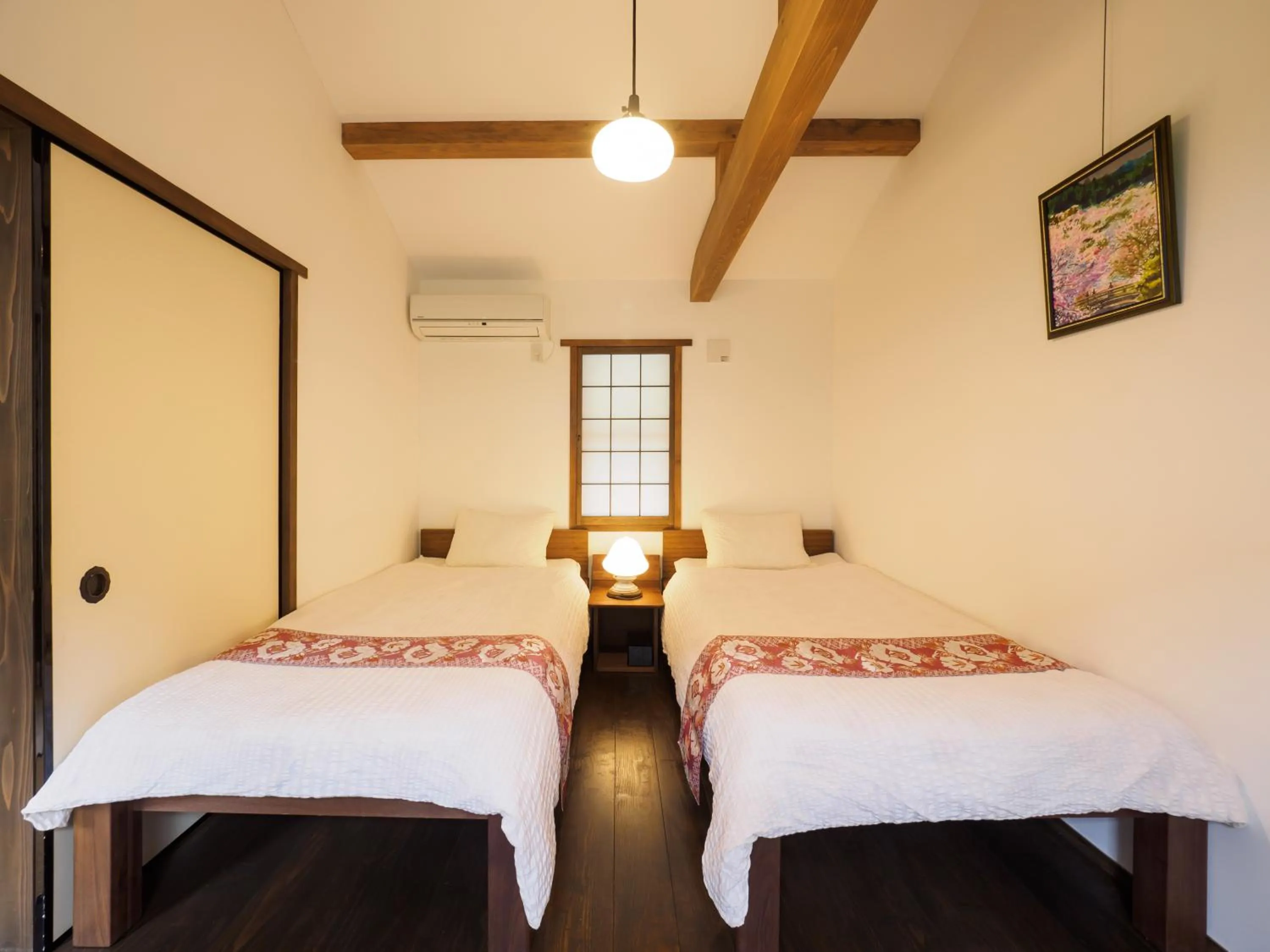 Bed in Inase Otsu Machiya Bed and Breakfast