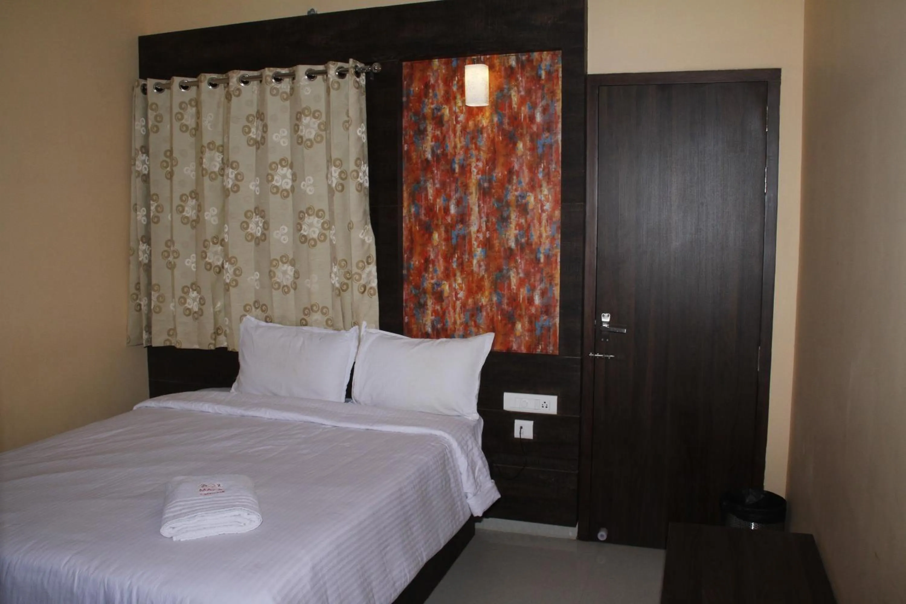Photo of the whole room, Bed in Jeyam Residency