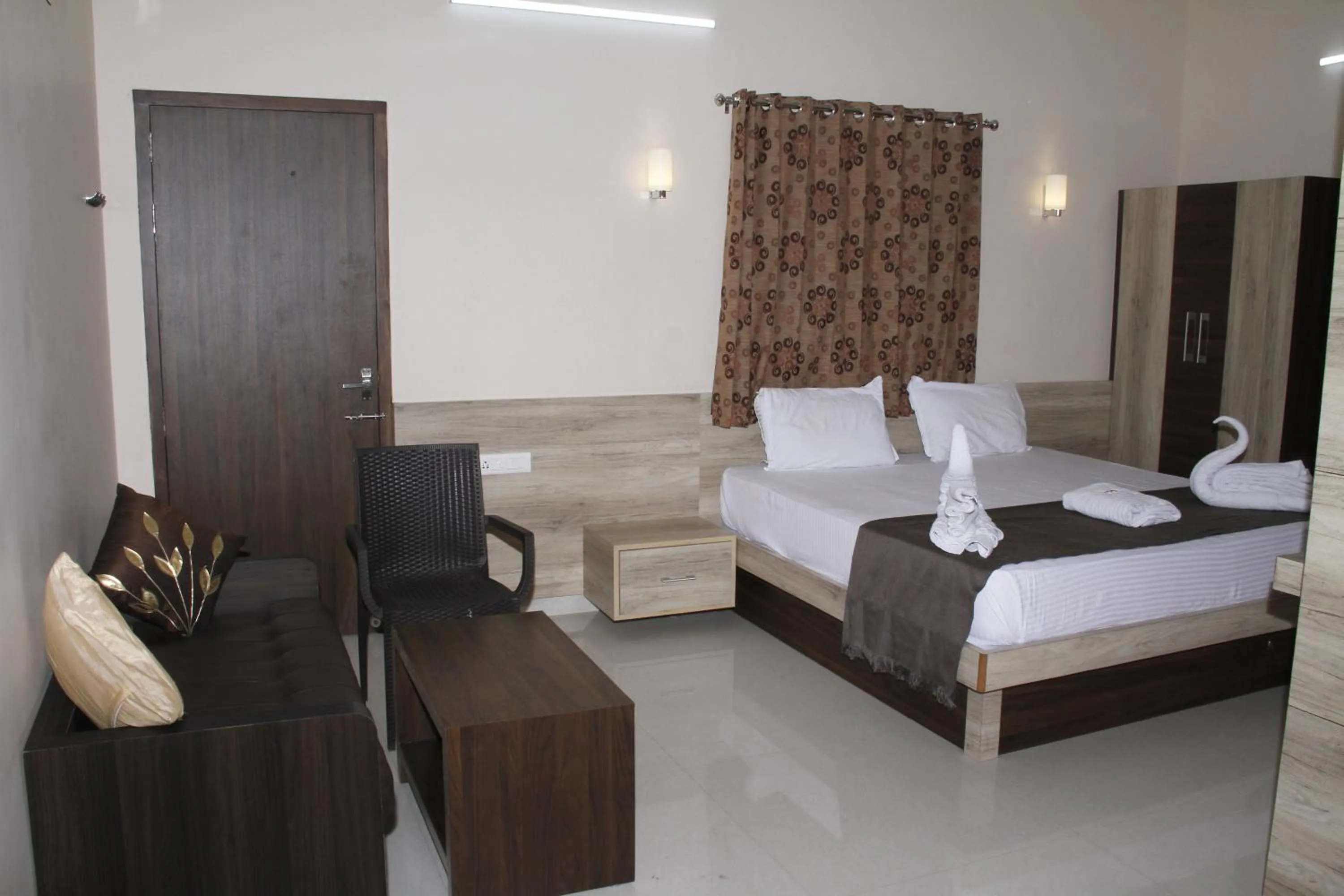 Photo of the whole room, Bed in Jeyam Residency
