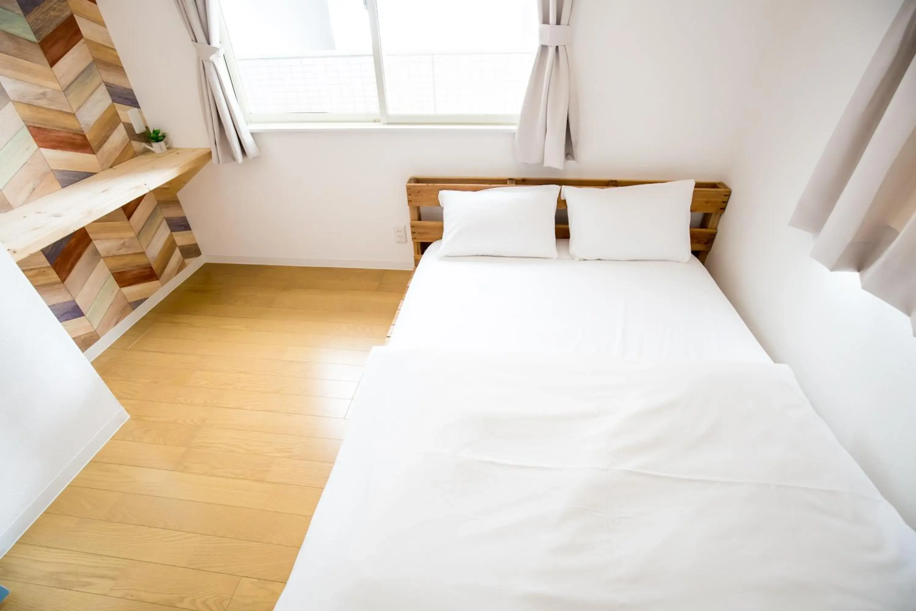 Bed in IZA Enoshima Guest House and Bar Bed in IZA Enoshima Guest House and Bar