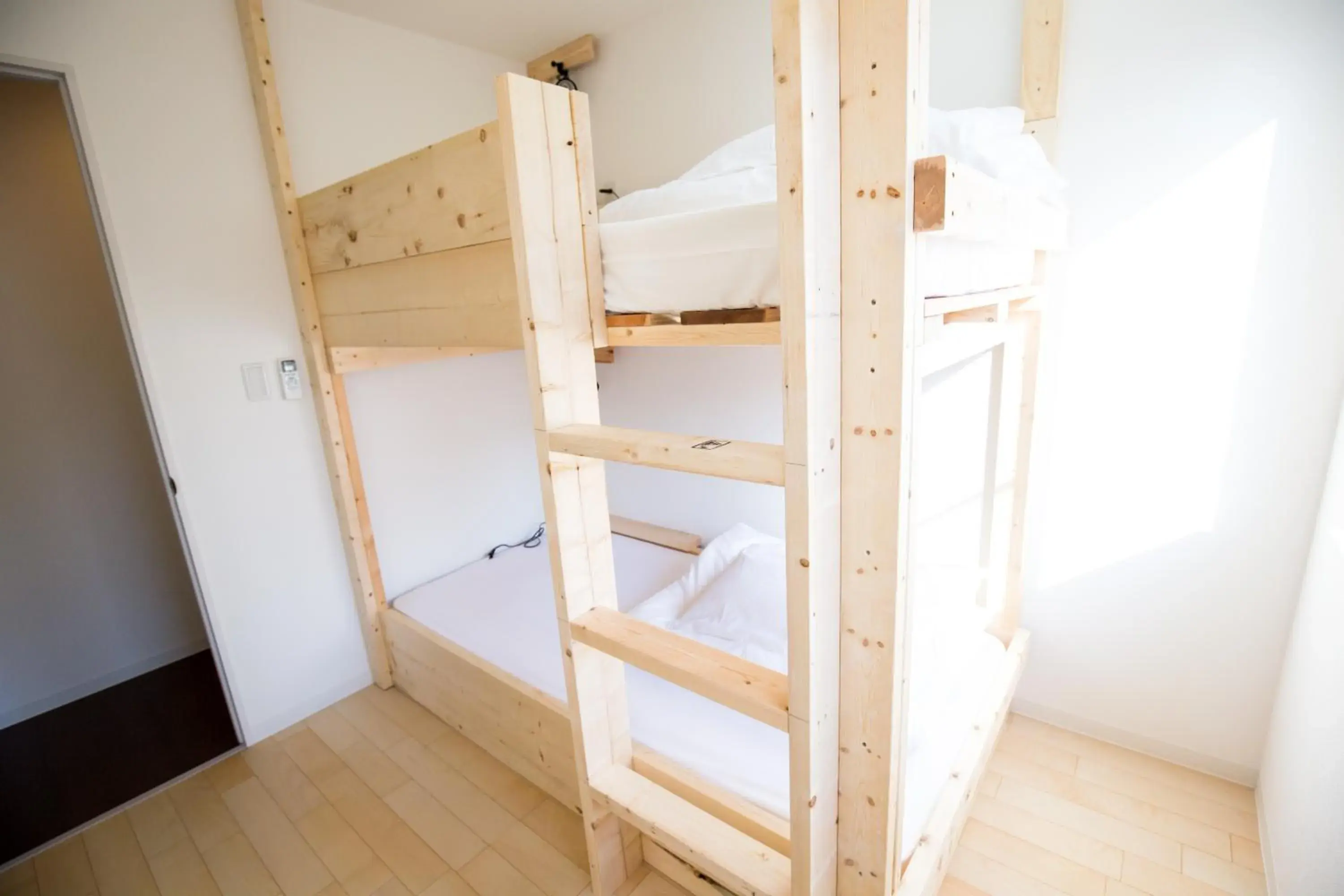 Bed in IZA Enoshima Guest House and Bar Bed in IZA Enoshima Guest House and Bar