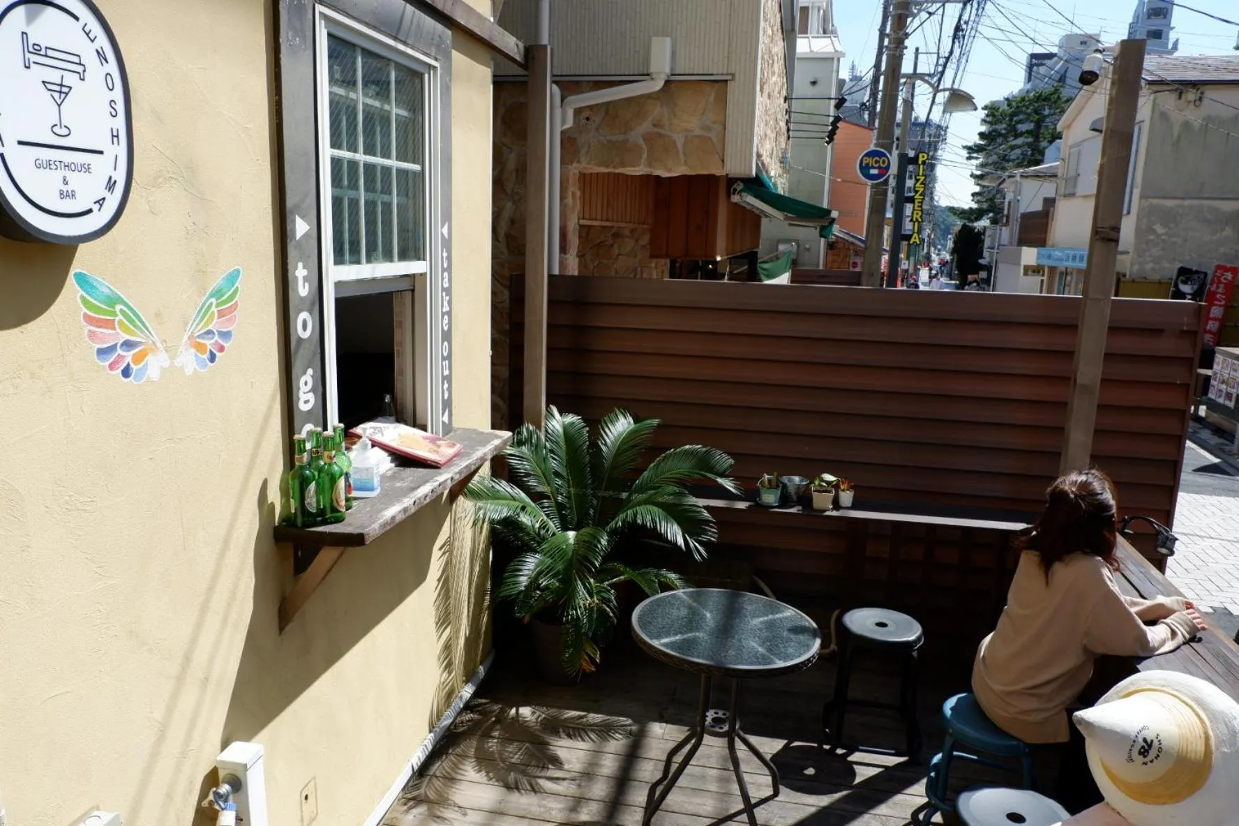 Staff in IZA Enoshima Guest House and Bar