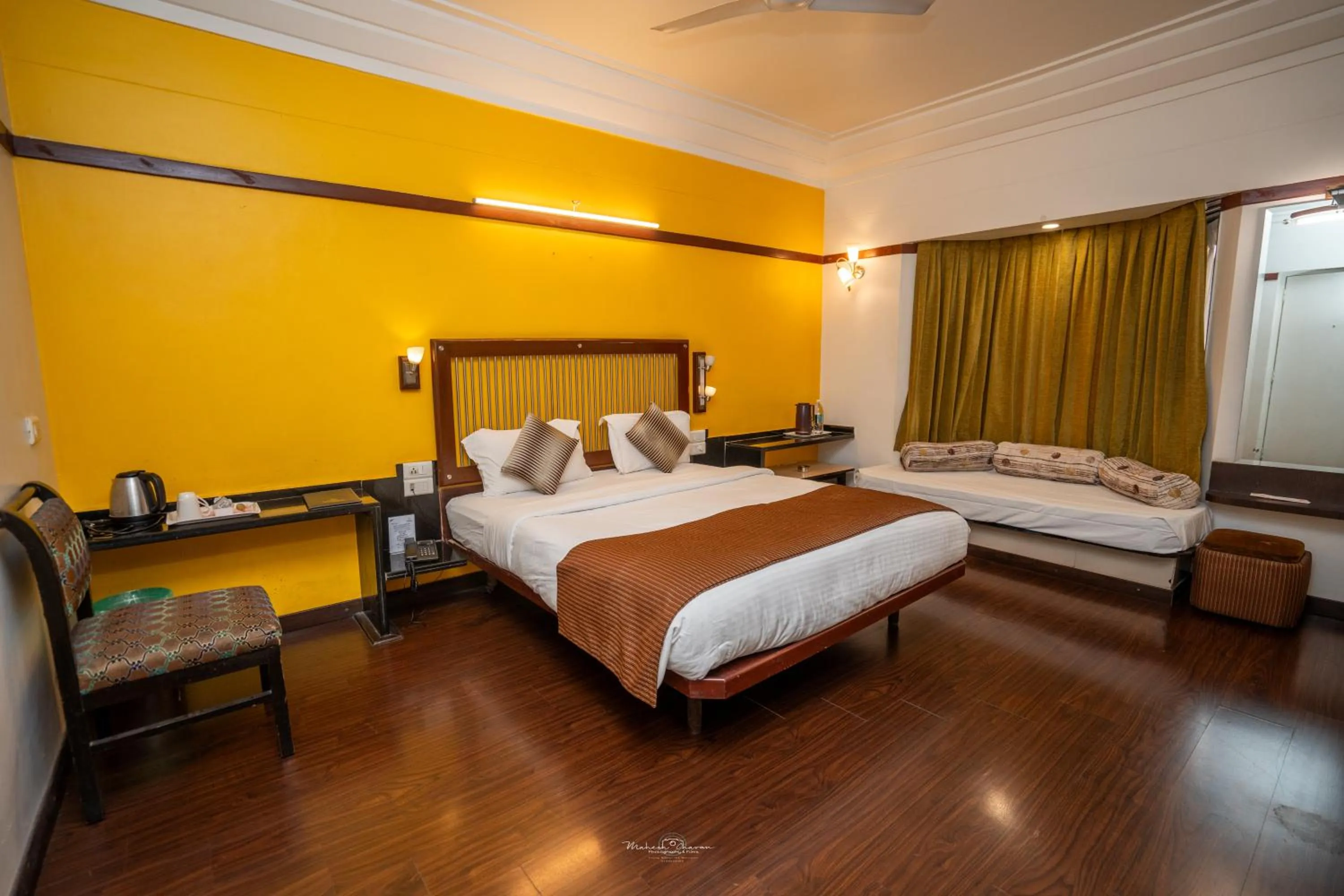 Photo of the whole room, Bed in Hotel Vrishali Executive
