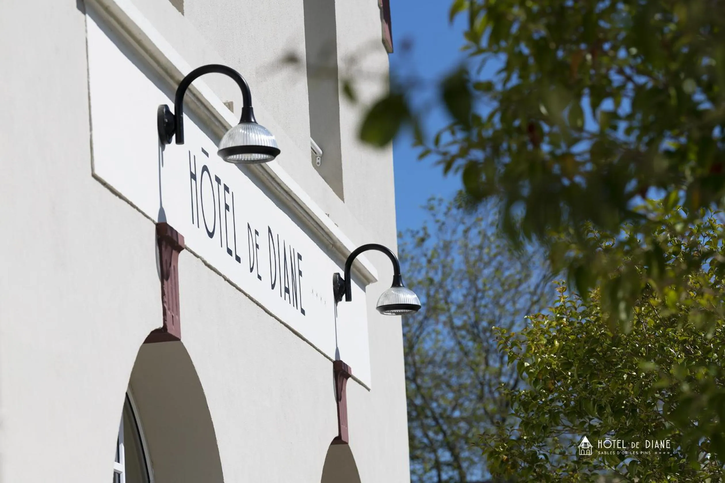 Property logo or sign in Hotel De Diane