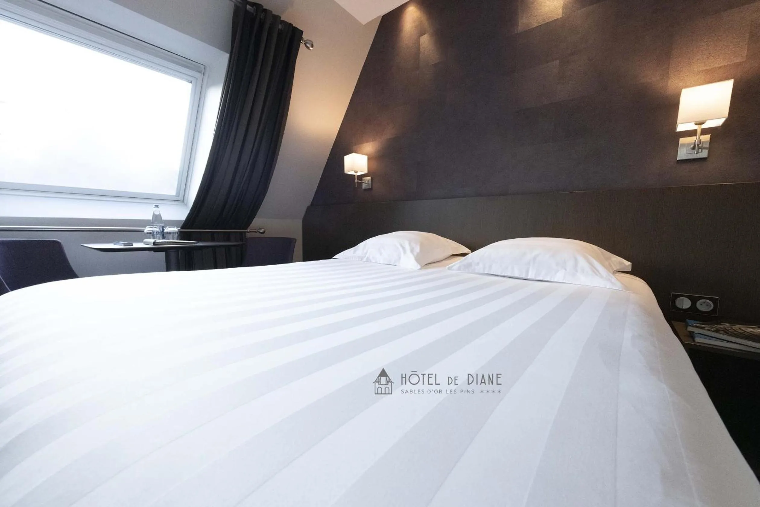 Bed in Hotel De Diane