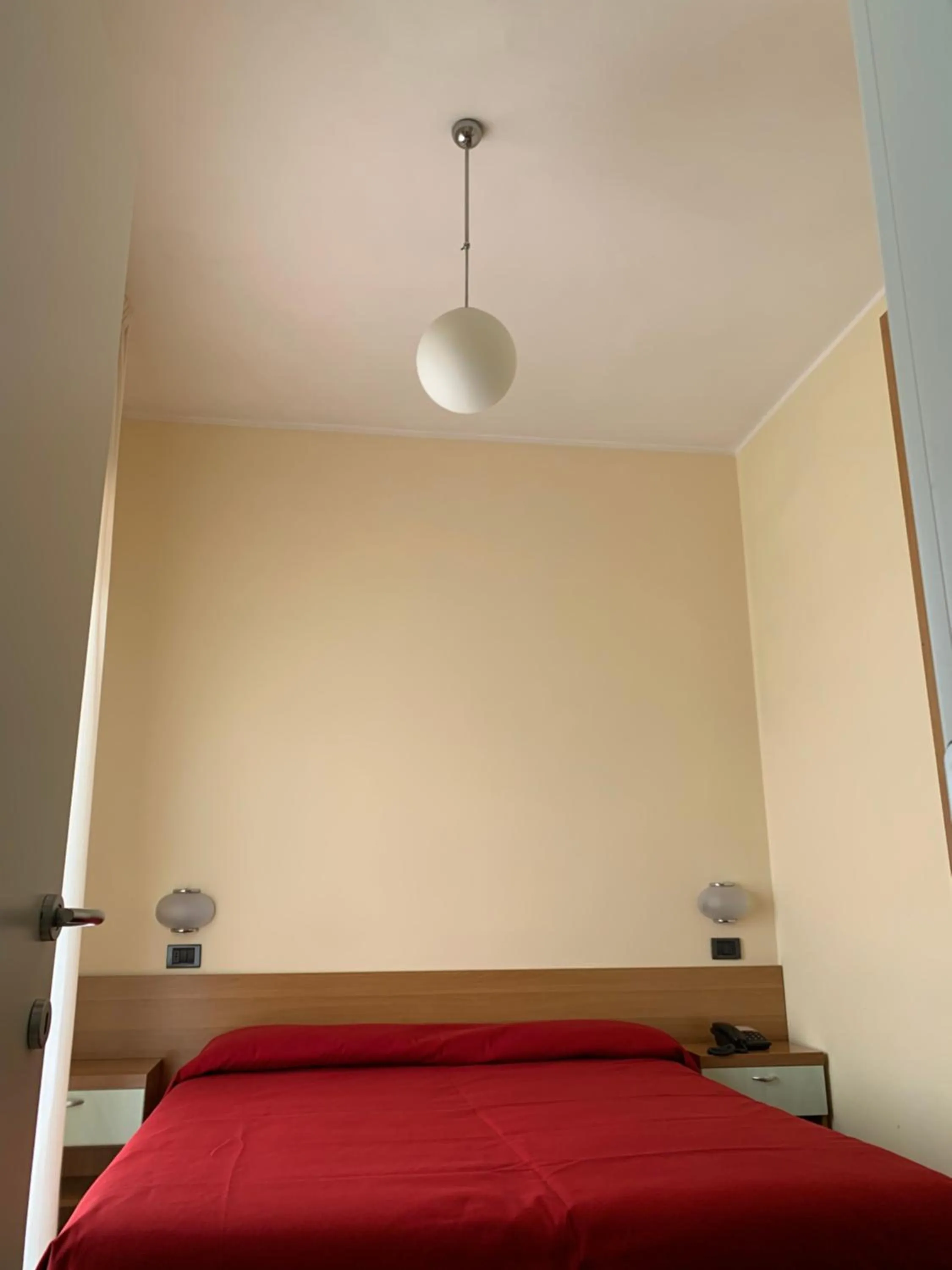 Bed in Hotel Flamingo