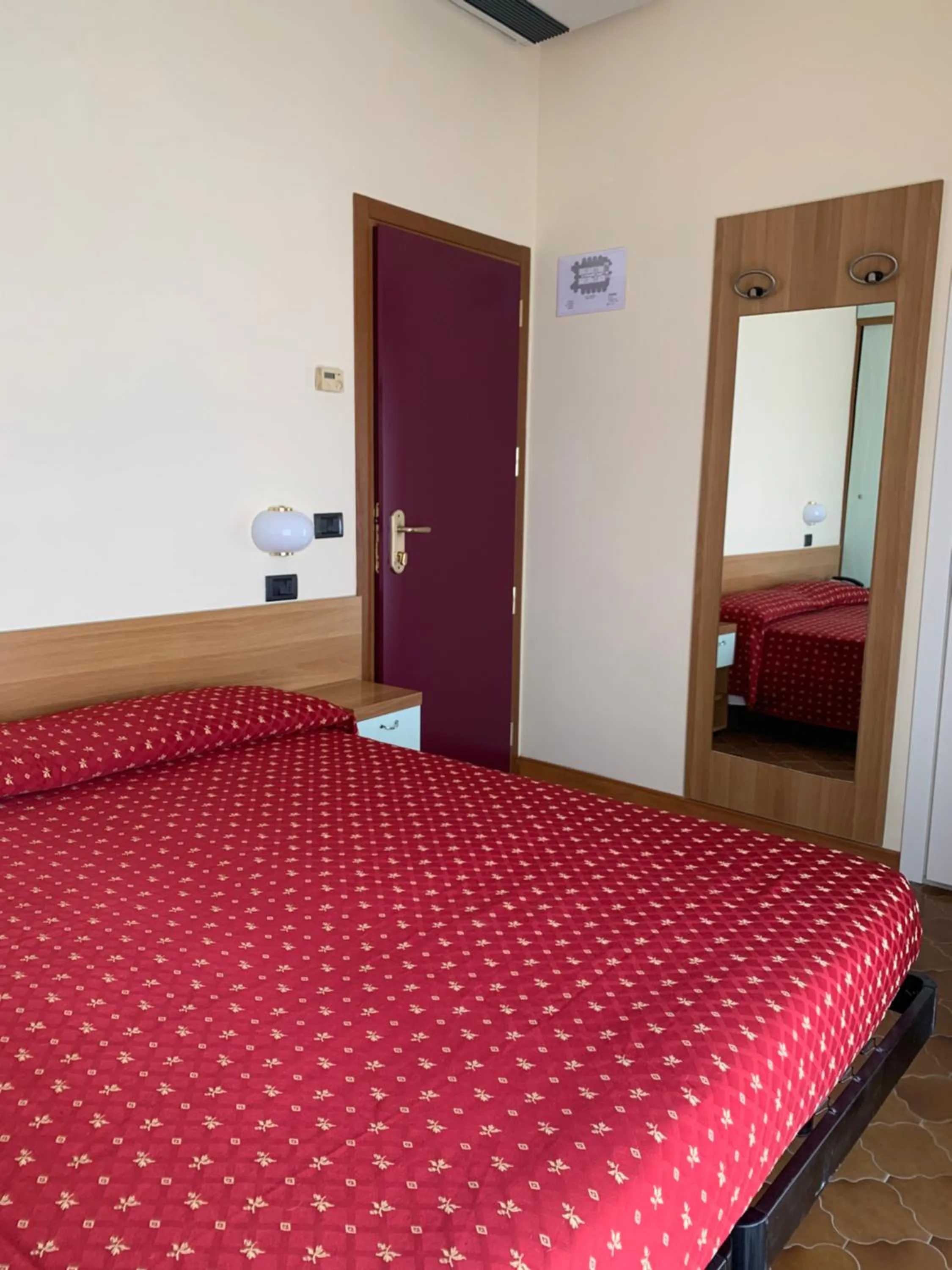 Bed in Hotel Flamingo