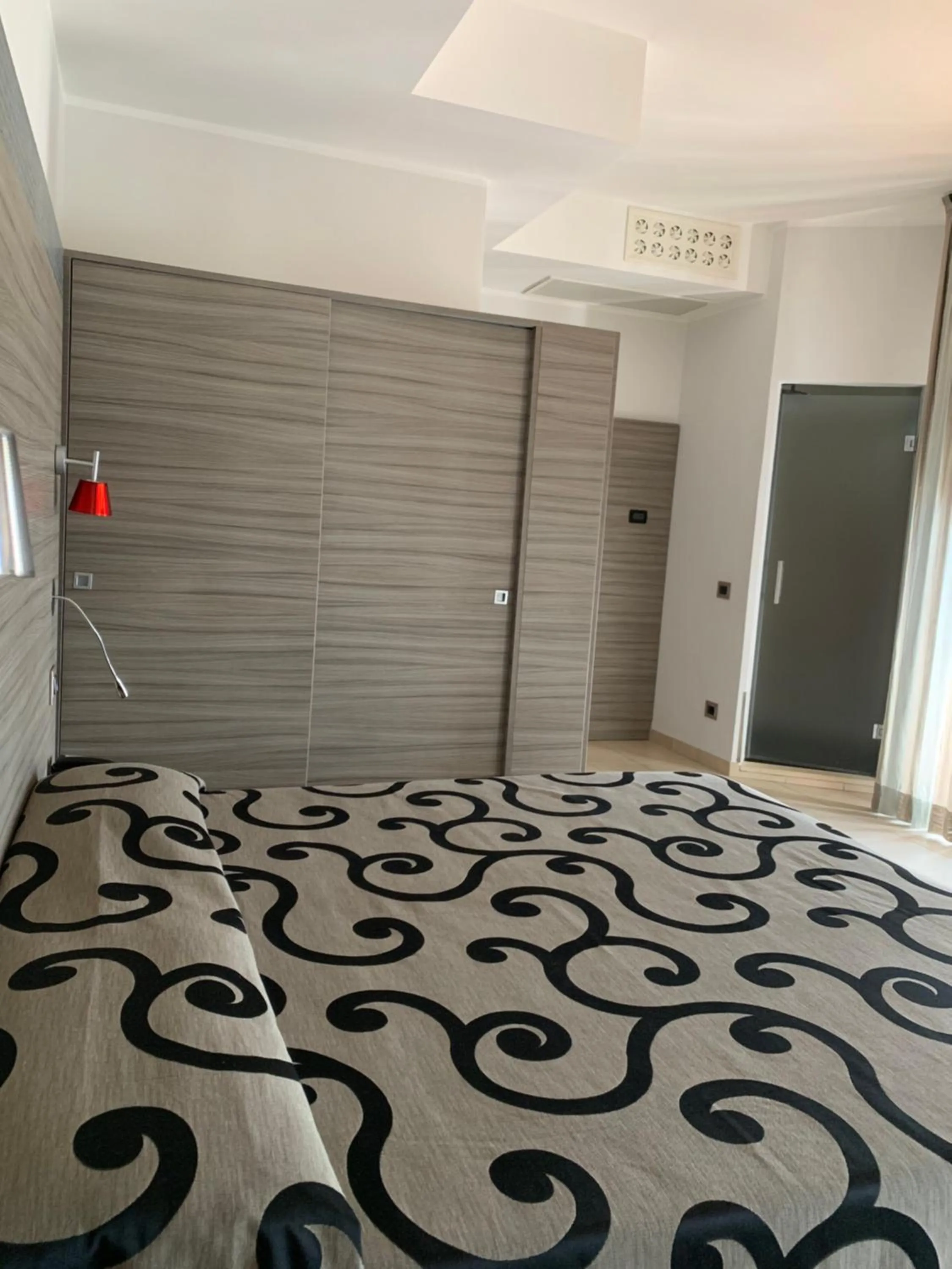 Bed in Hotel Flamingo