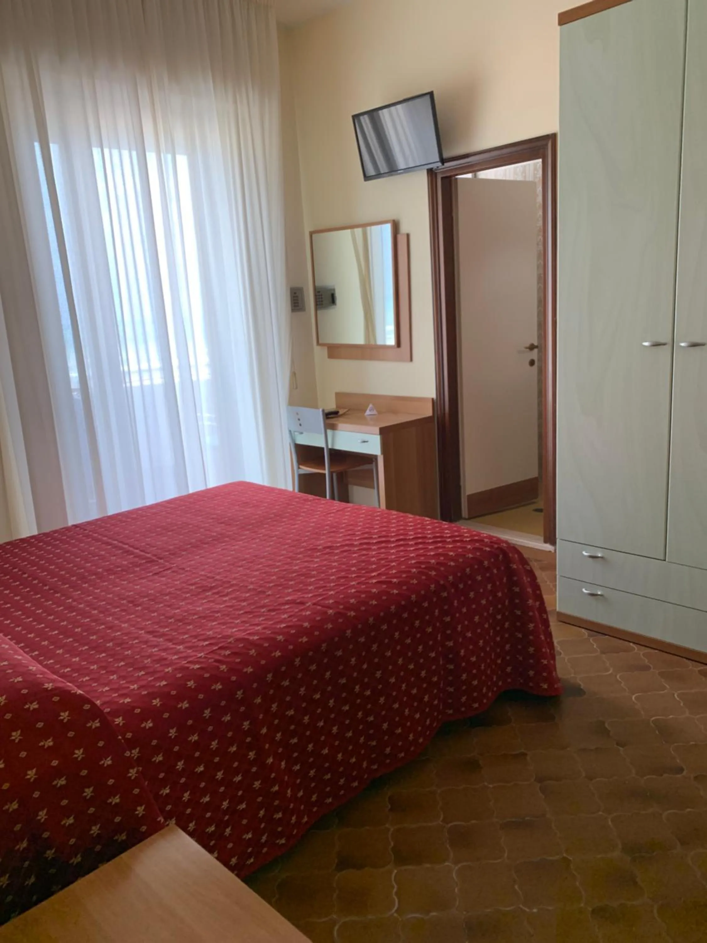 Bed in Hotel Flamingo