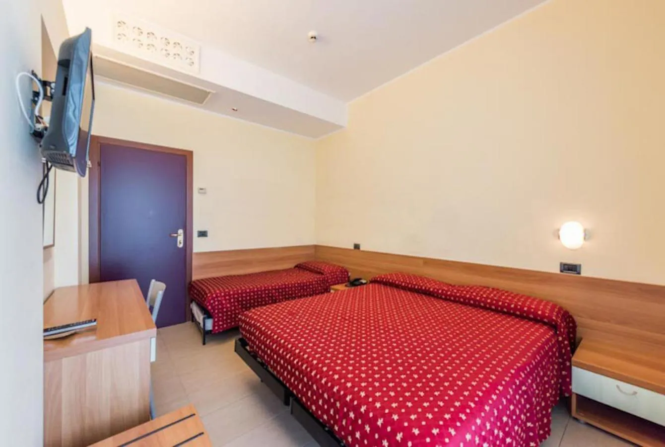 Bed in Hotel Flamingo