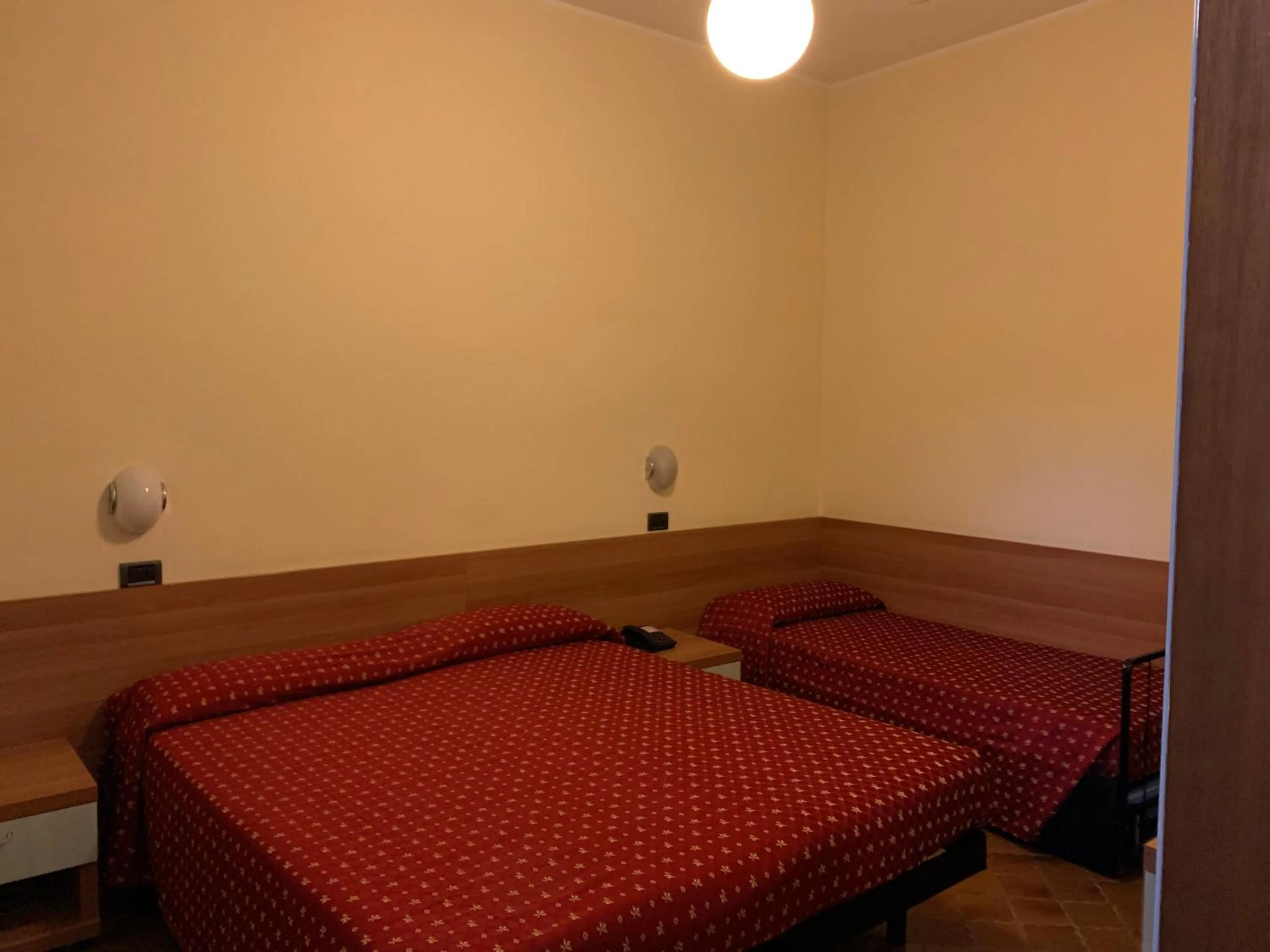 Bed in Hotel Flamingo