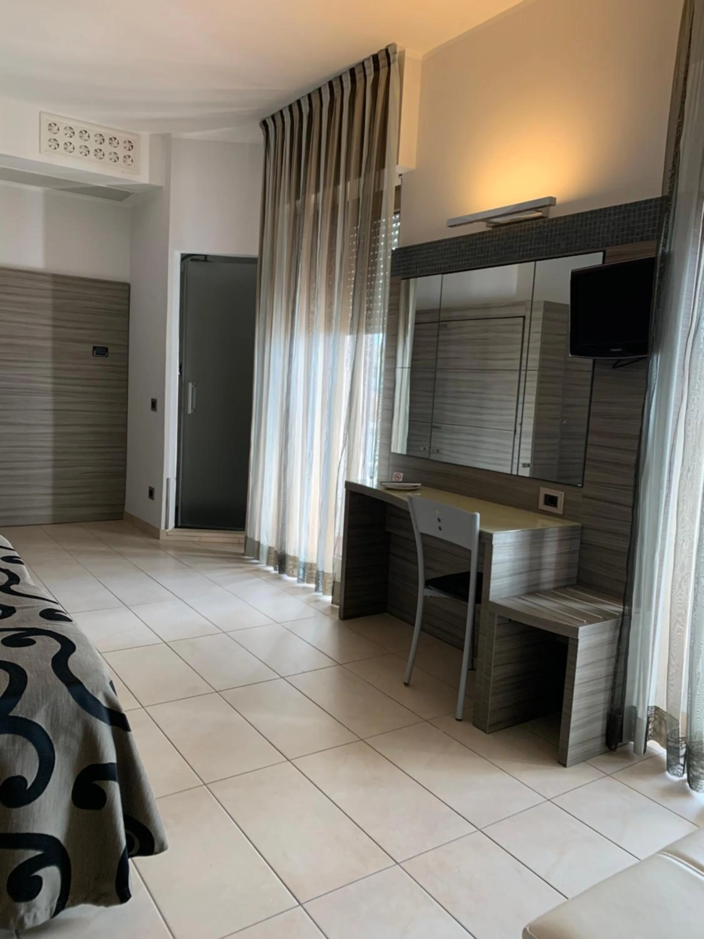 Bed in Hotel Flamingo