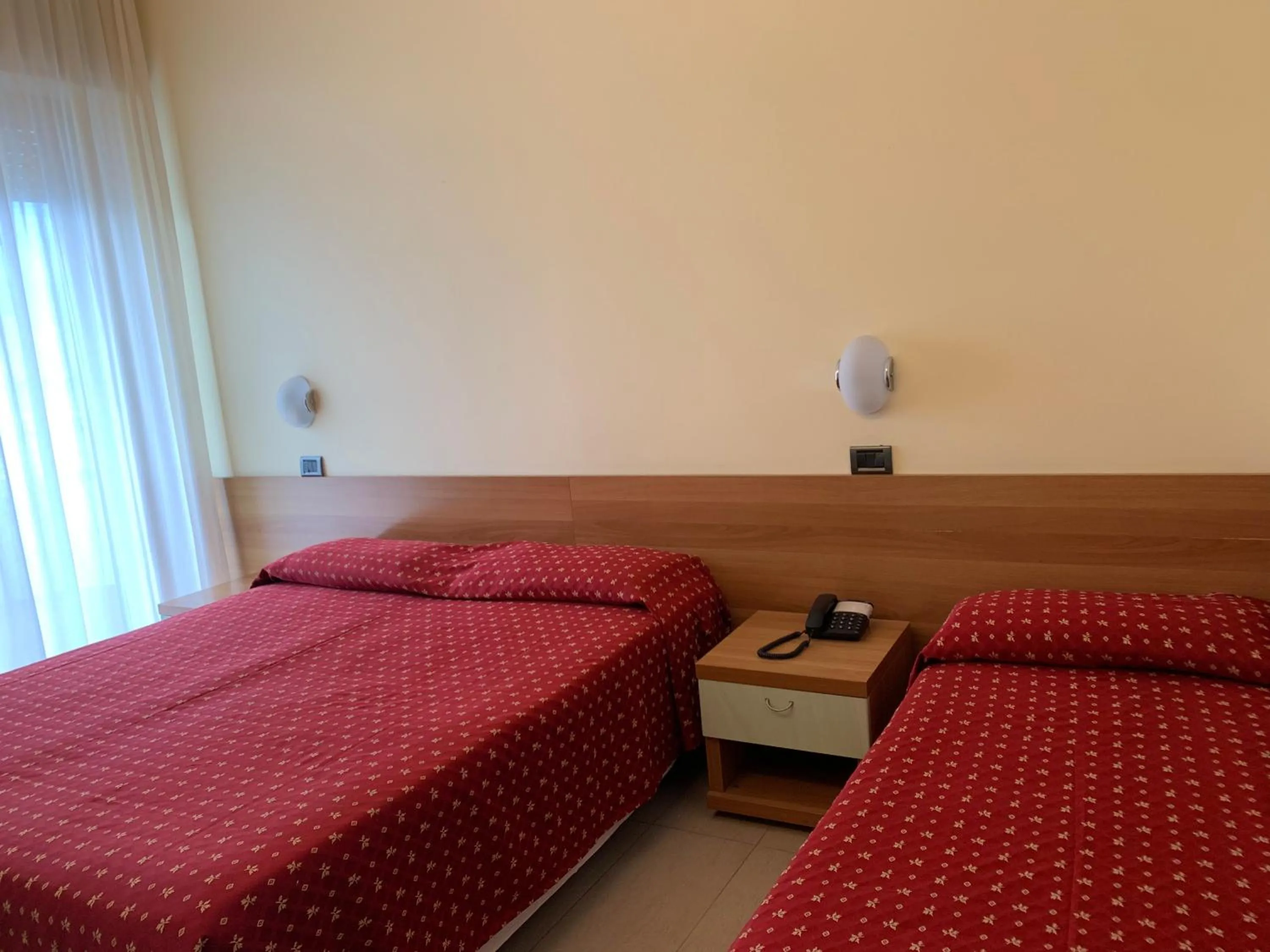 Bed in Hotel Flamingo