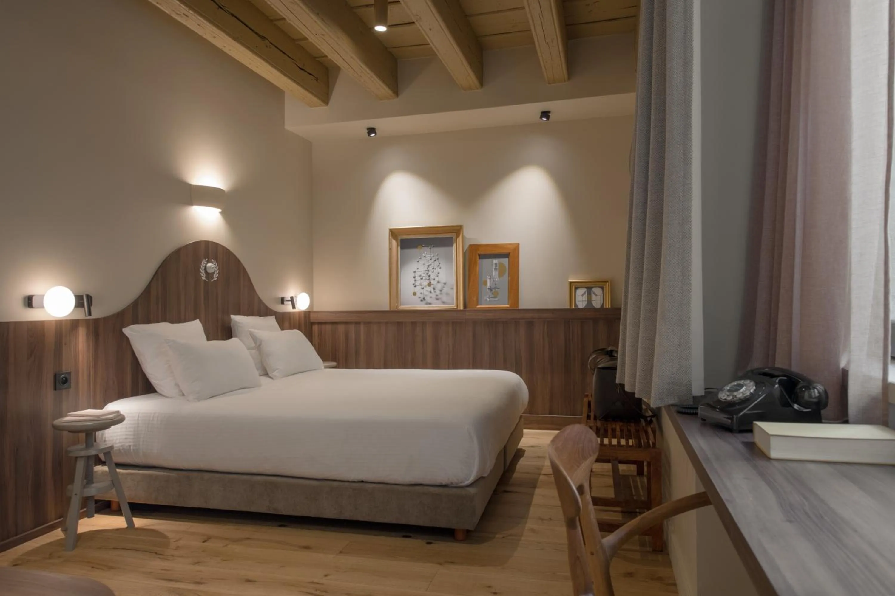 Bed in Académie Hôtel Lyon