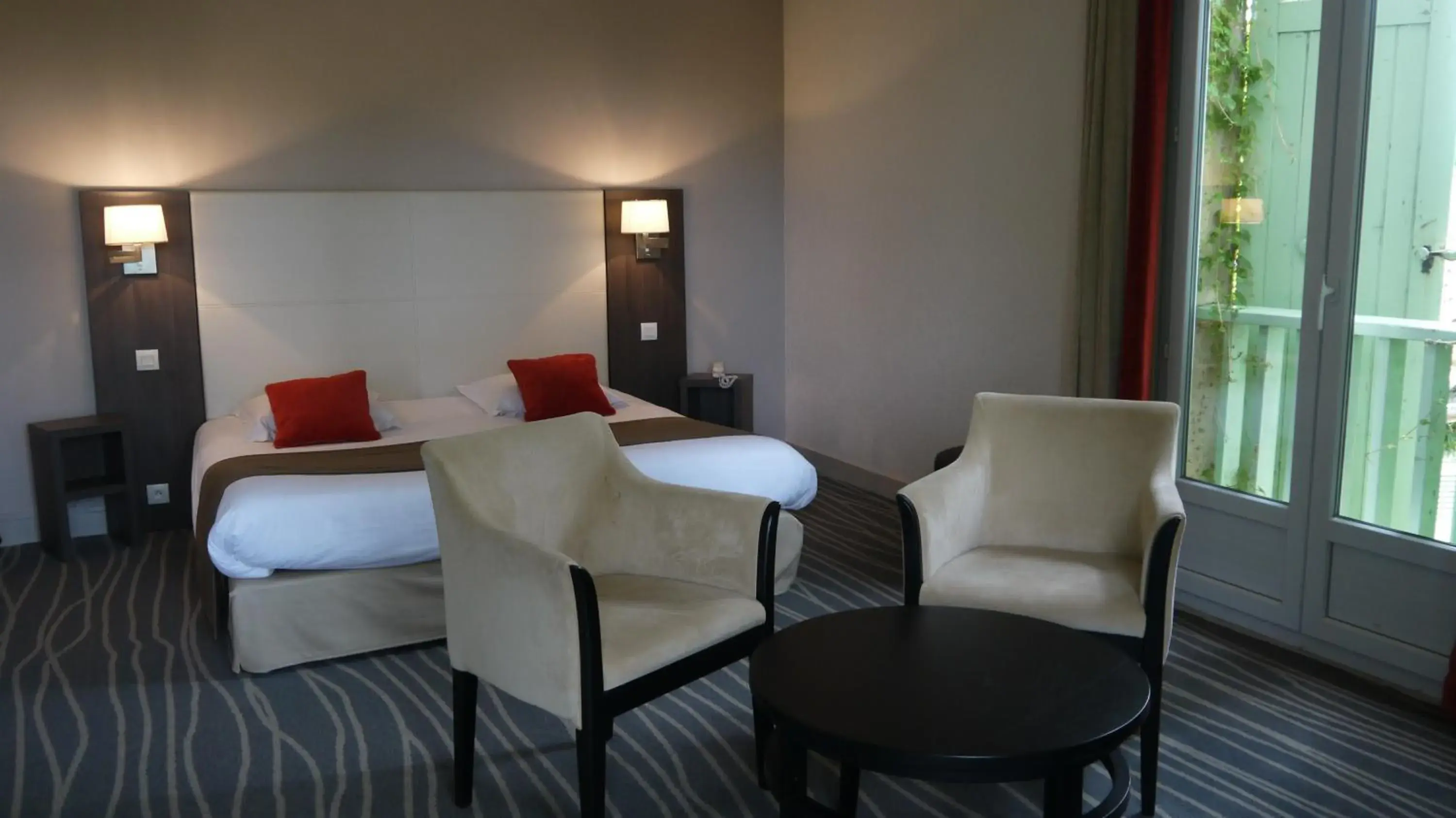 Photo of the whole room, Bed in Logis Hôtels- Hôtel et Restaurant Domaine de Fompeyre Photo of the whole room, Bed in Logis Hôtels- Hôtel et Restaurant Domaine de Fompeyre