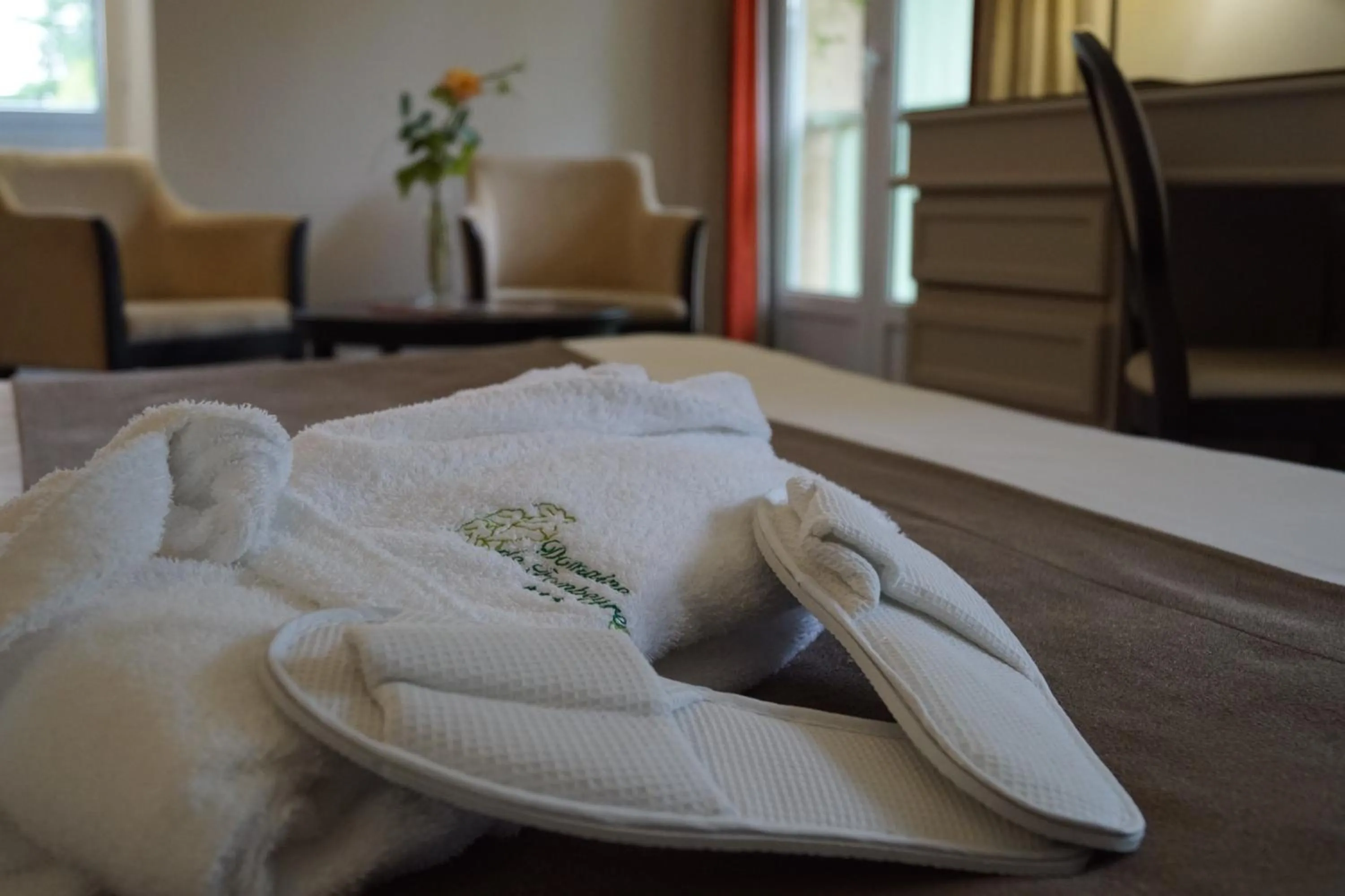 towels, Bed in Logis Hôtels- Hôtel et Restaurant Domaine de Fompeyre