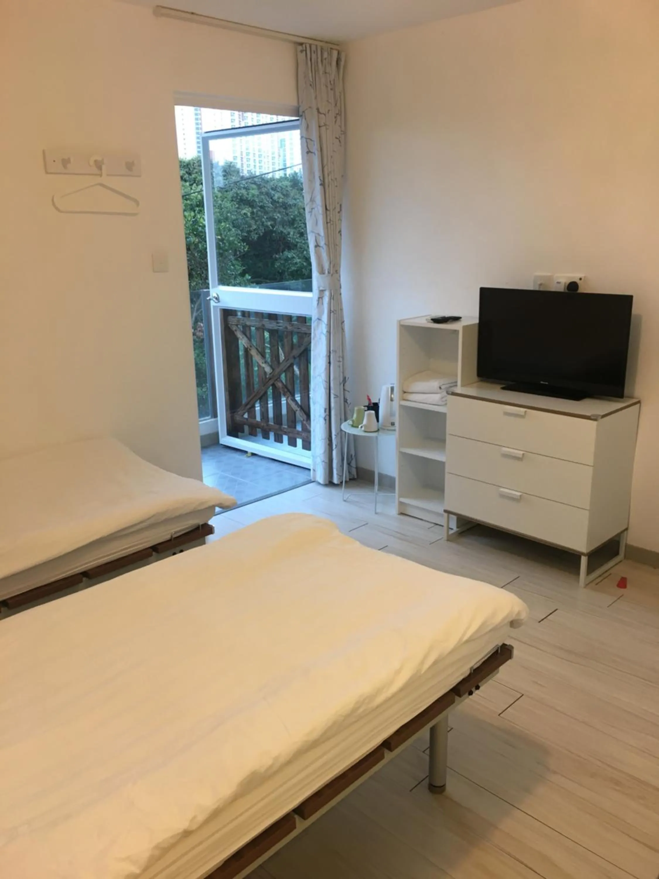 Bed in City Oasis Guesthouse