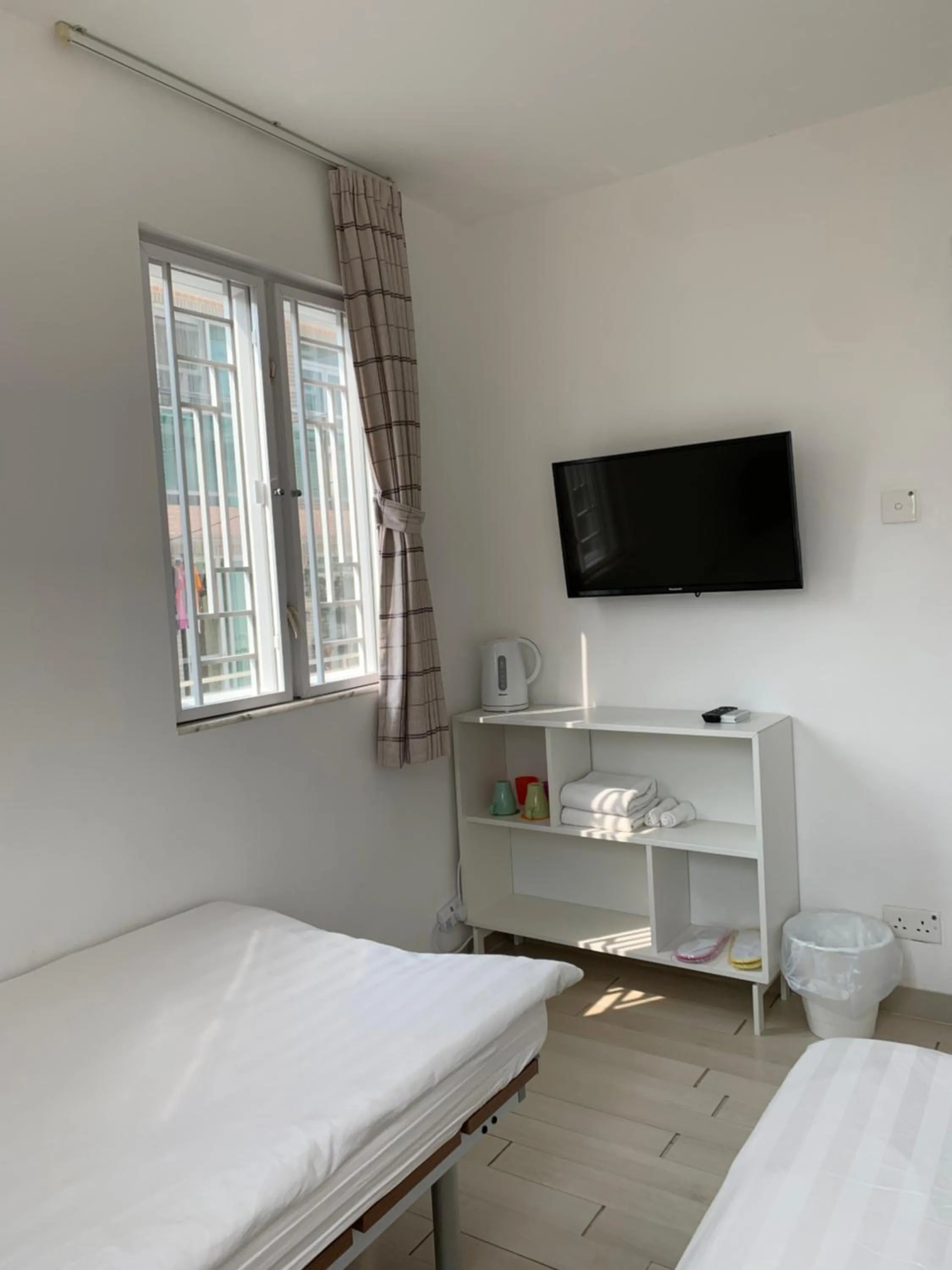 TV and multimedia, Bed in City Oasis Guesthouse