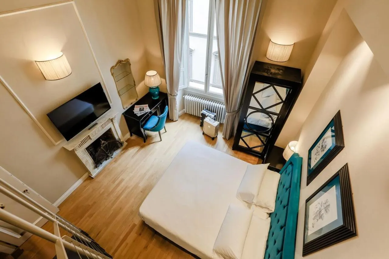 Bed in Relais Tosinghi