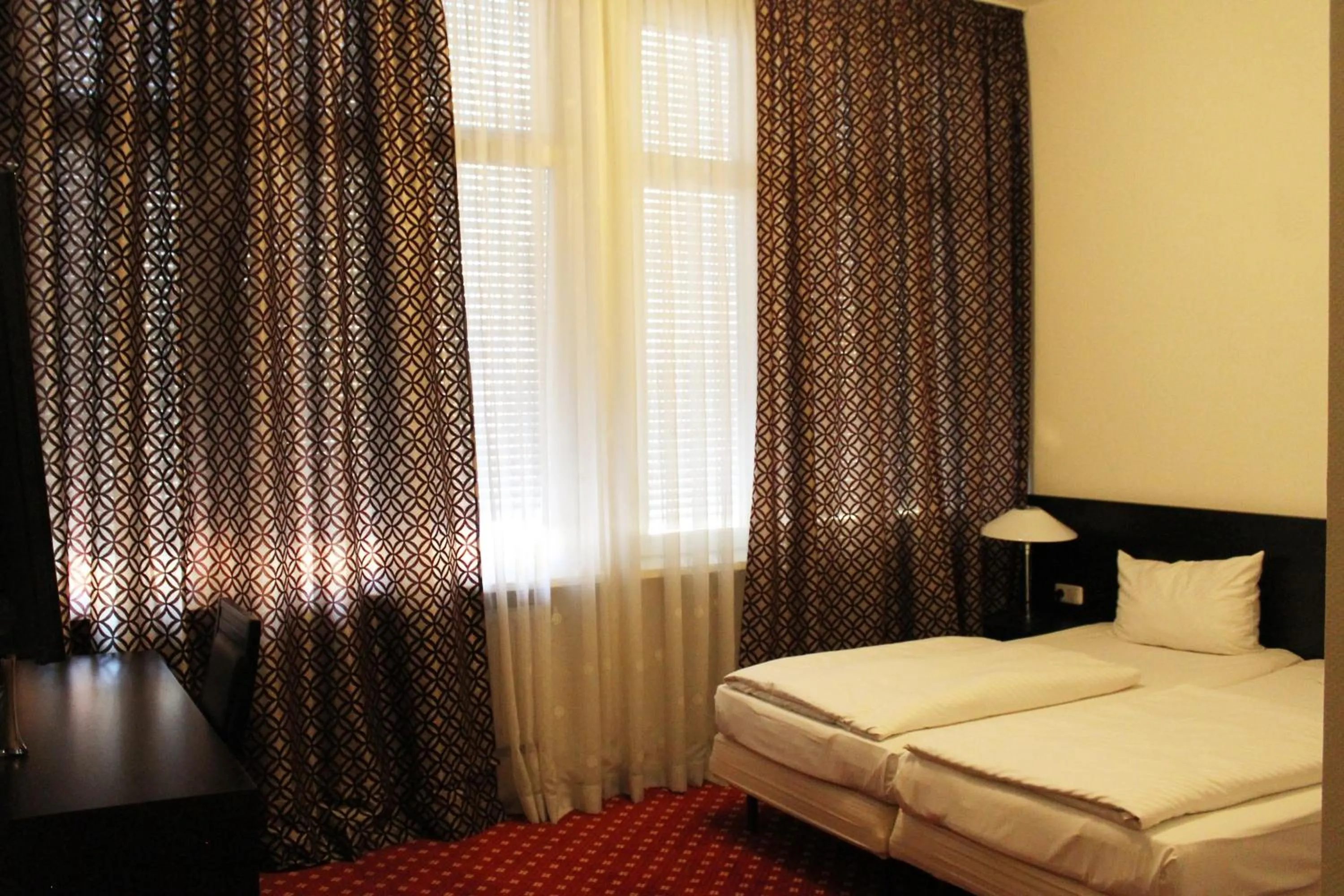 Bed in Aariana Hotel