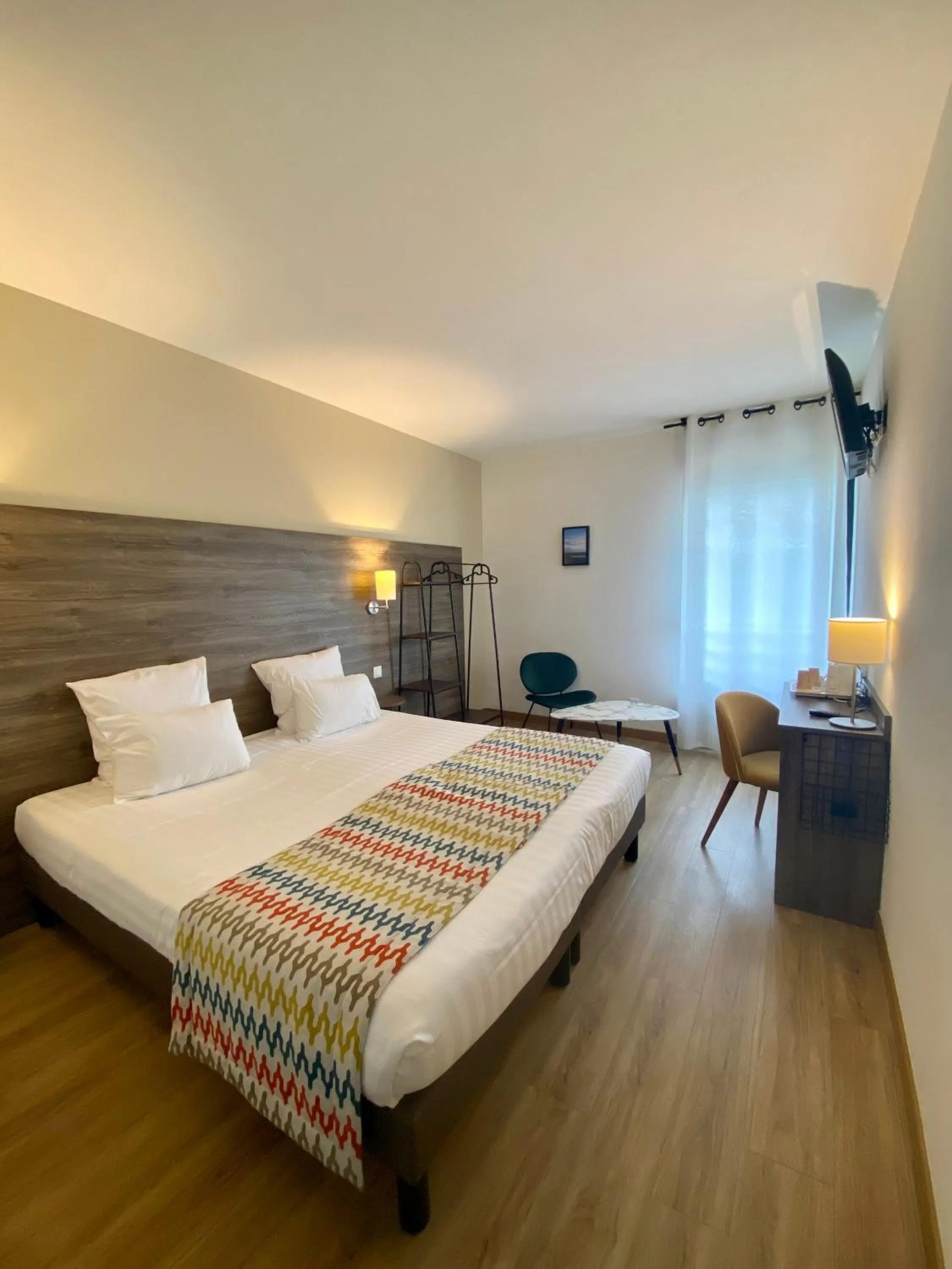 Bed in Hotel du Trégor