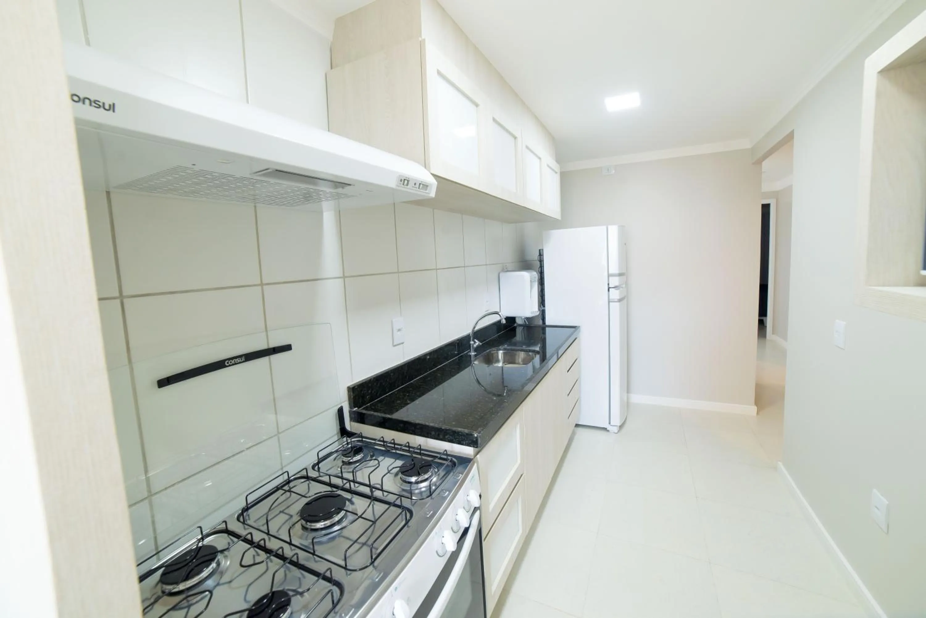 Kitchen or kitchenette in Golf Ville Resort Brisa do Golf -Apartamentos e Cobertura