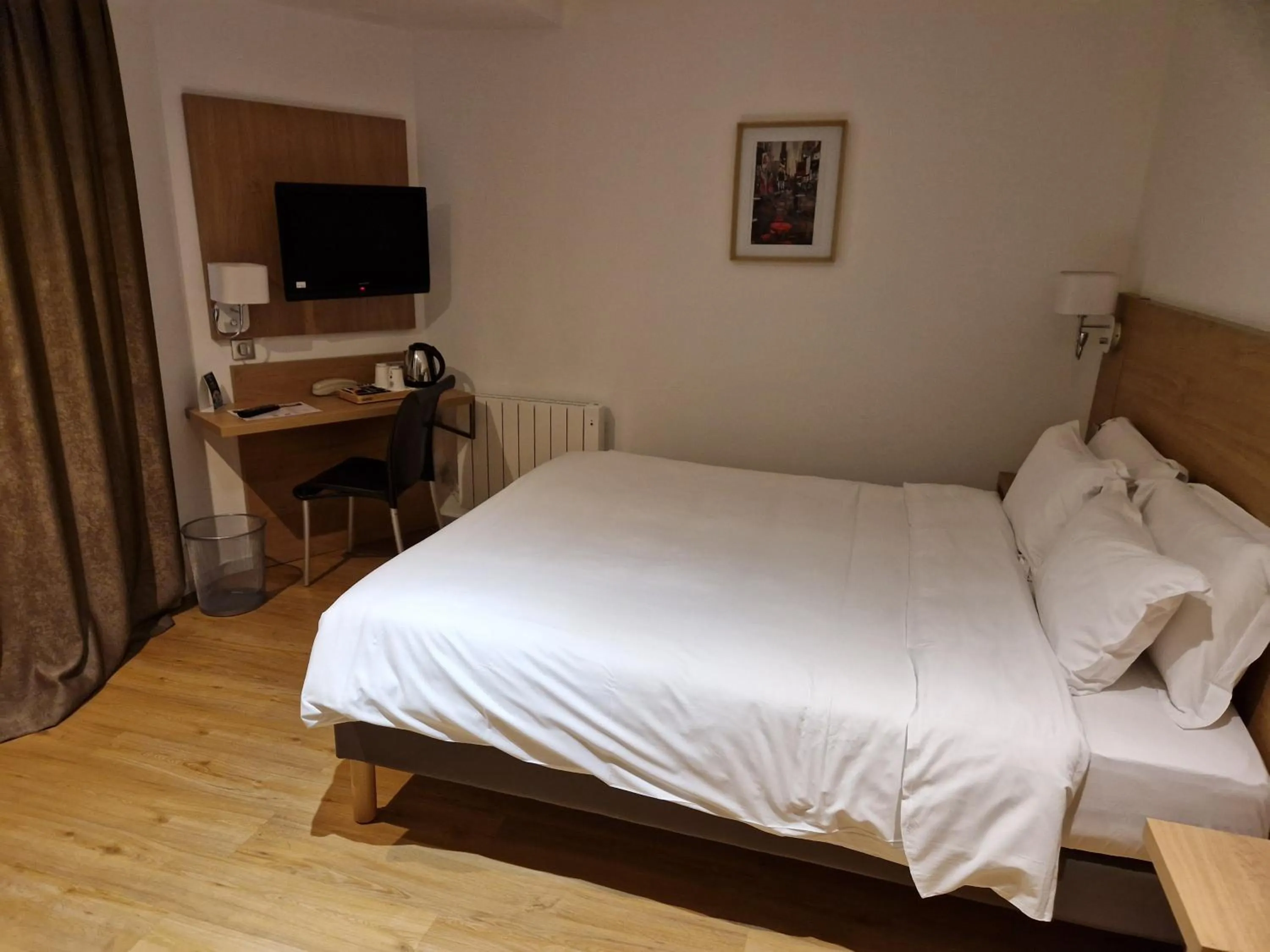 Bed in Kyriad Quimper Sud