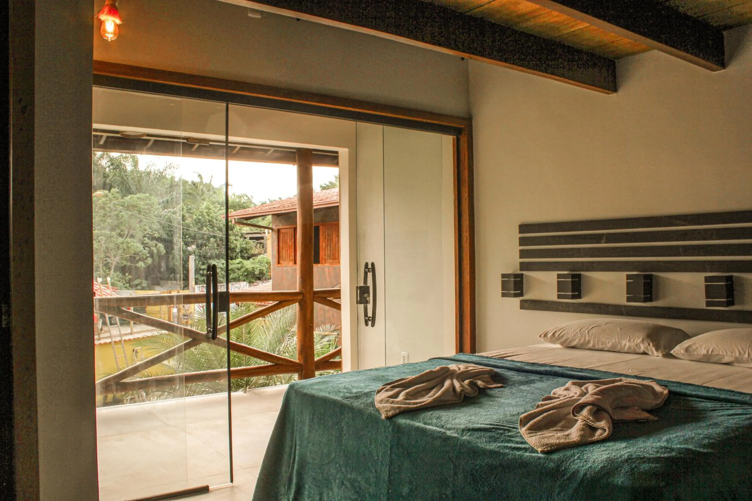 Bed in Pousada Recanto da Concha