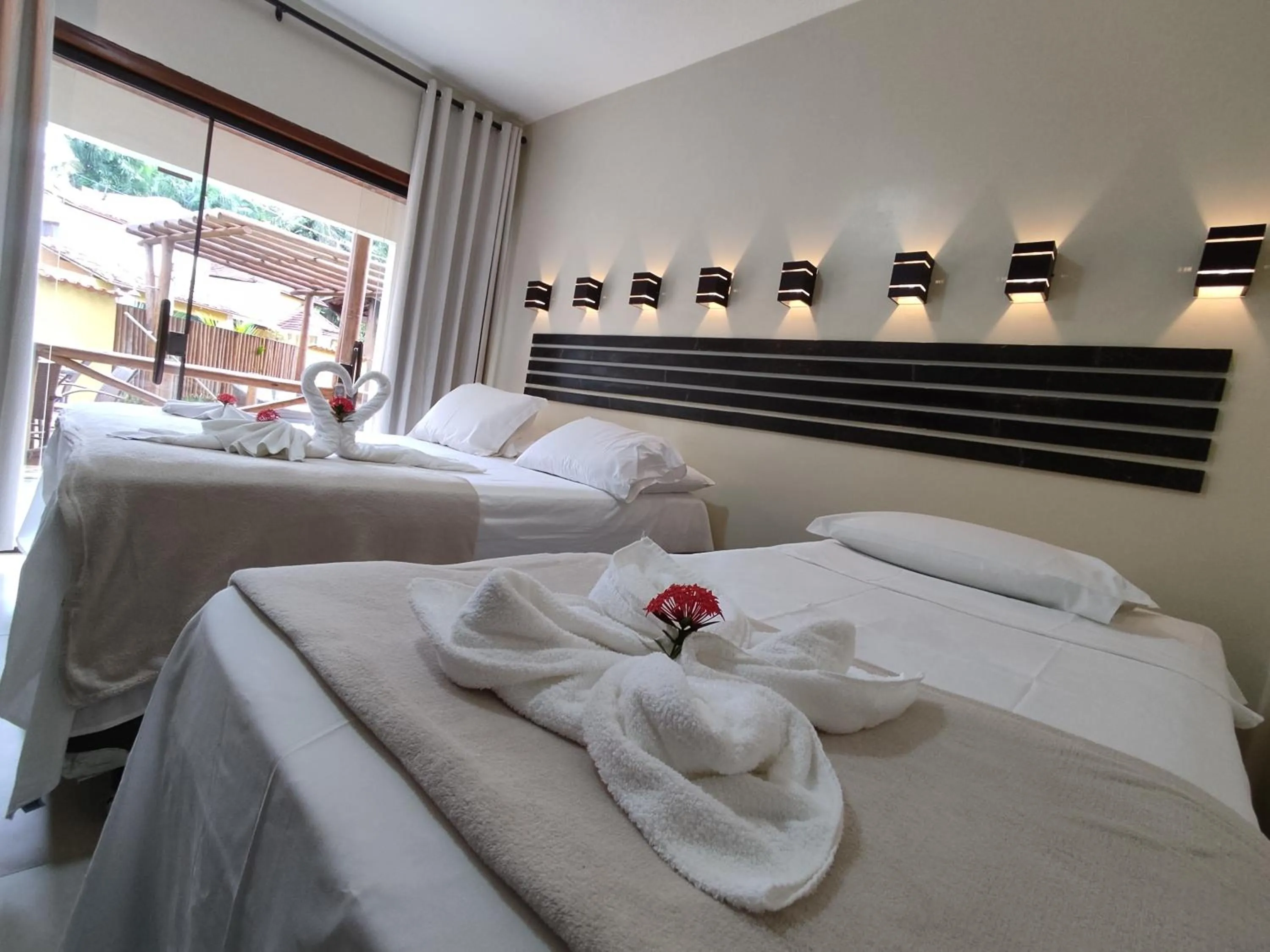 Bed in Pousada Recanto da Concha