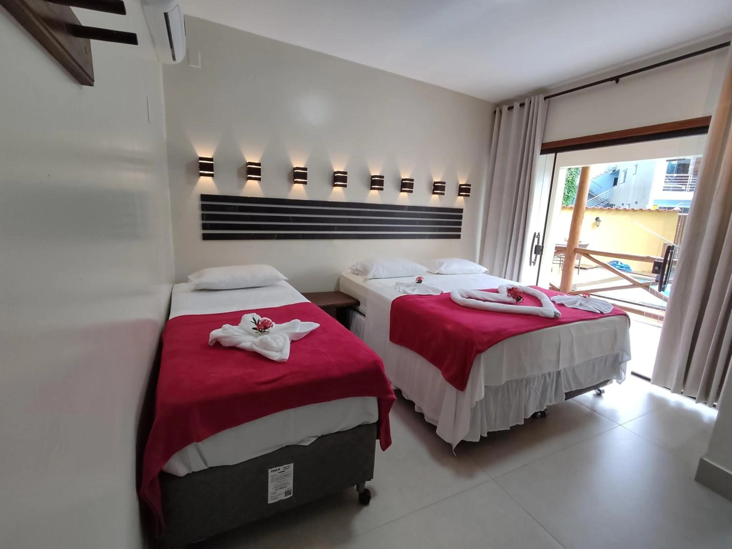 Bed in Pousada Recanto da Concha