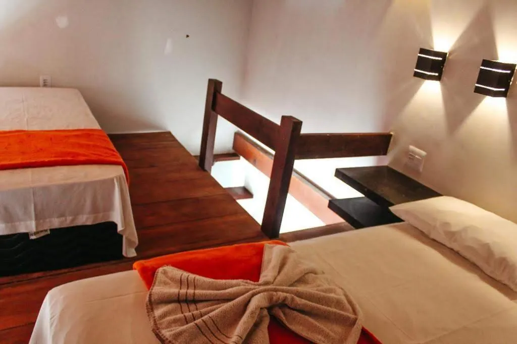Bed in Pousada Recanto da Concha