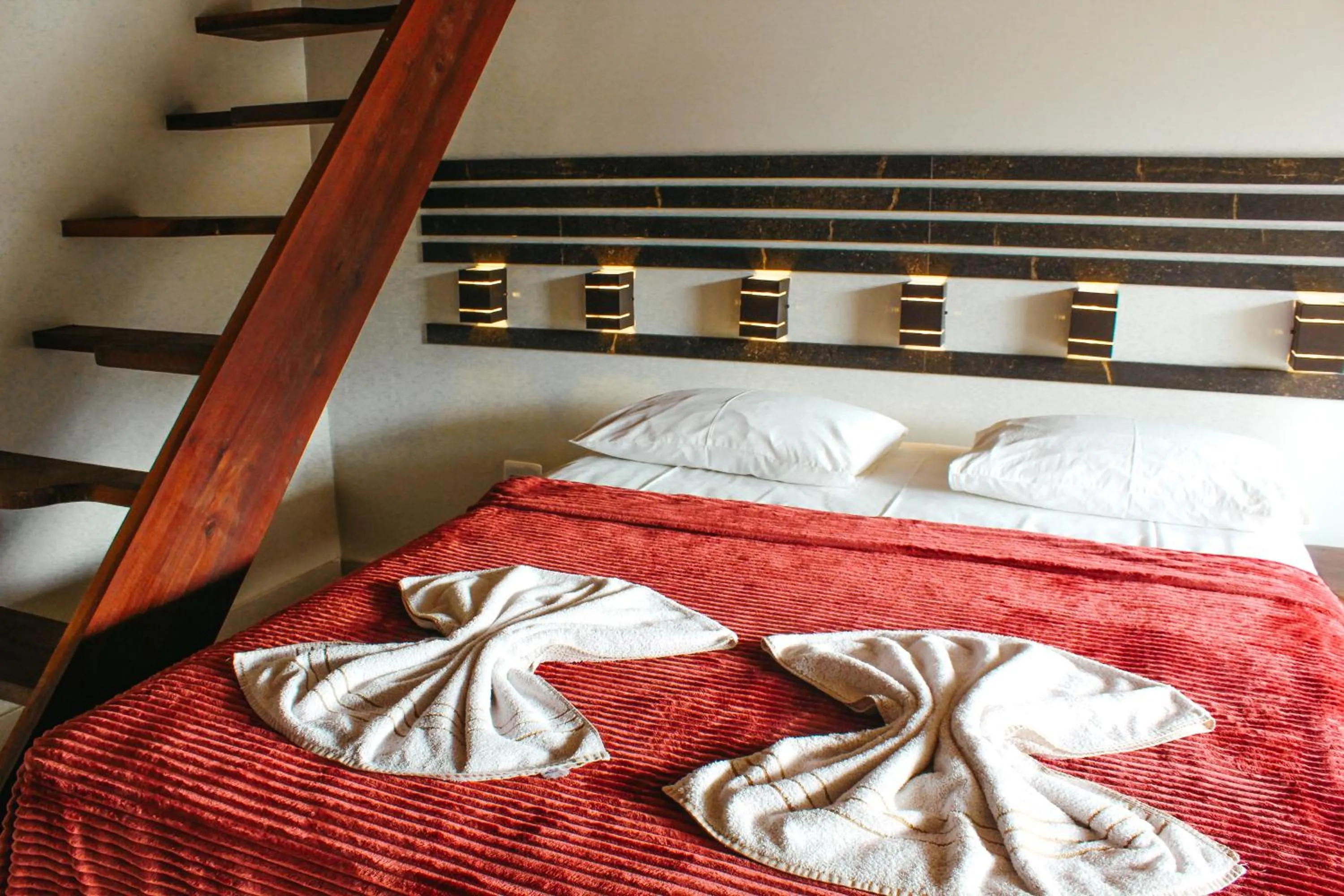 Bed in Pousada Recanto da Concha