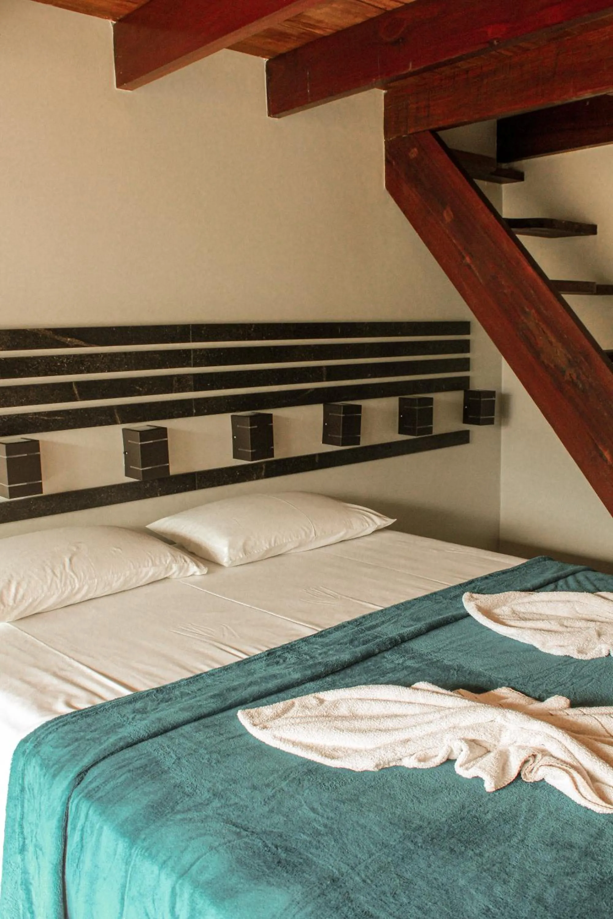 Bed in Pousada Recanto da Concha