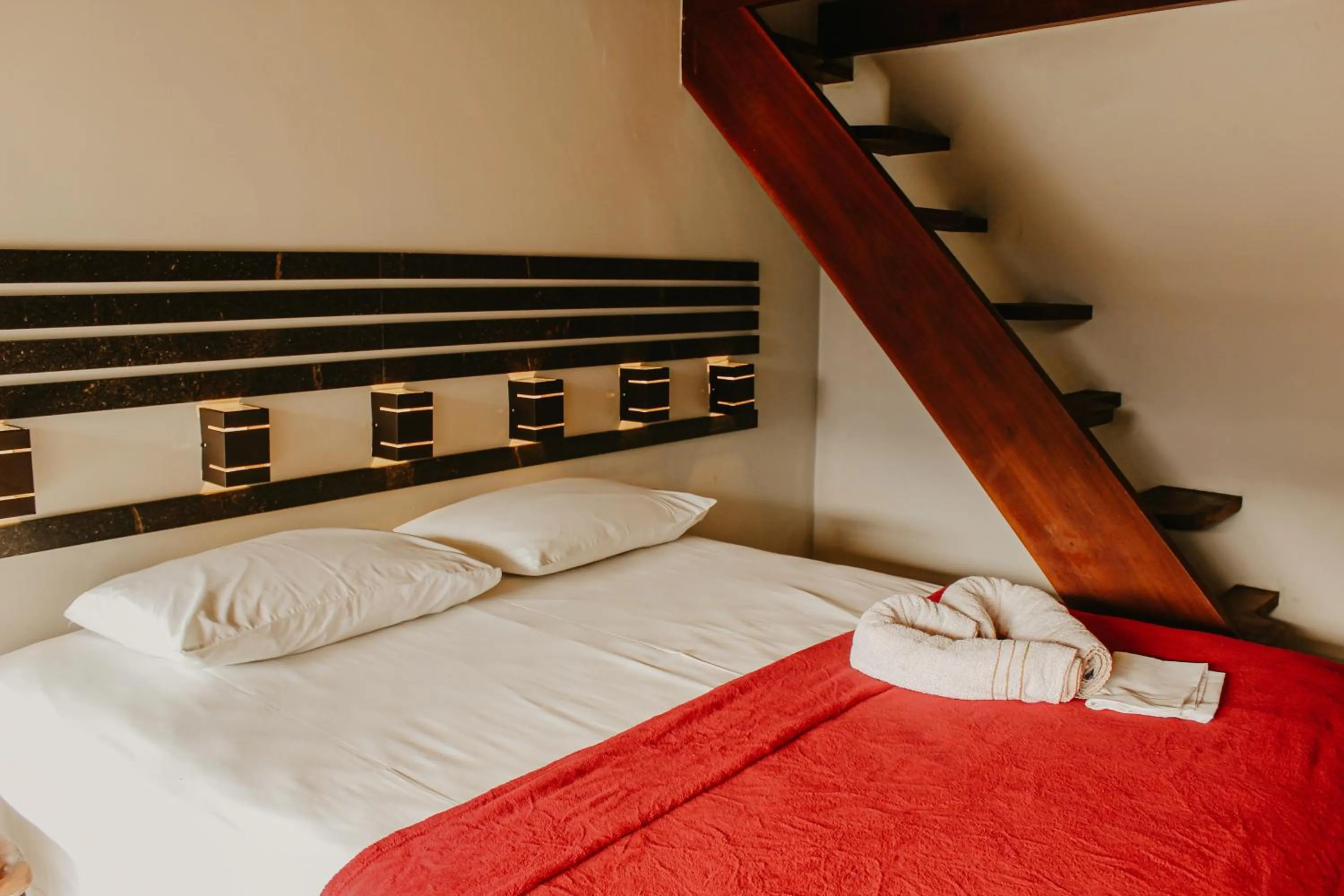 Bed in Pousada Recanto da Concha
