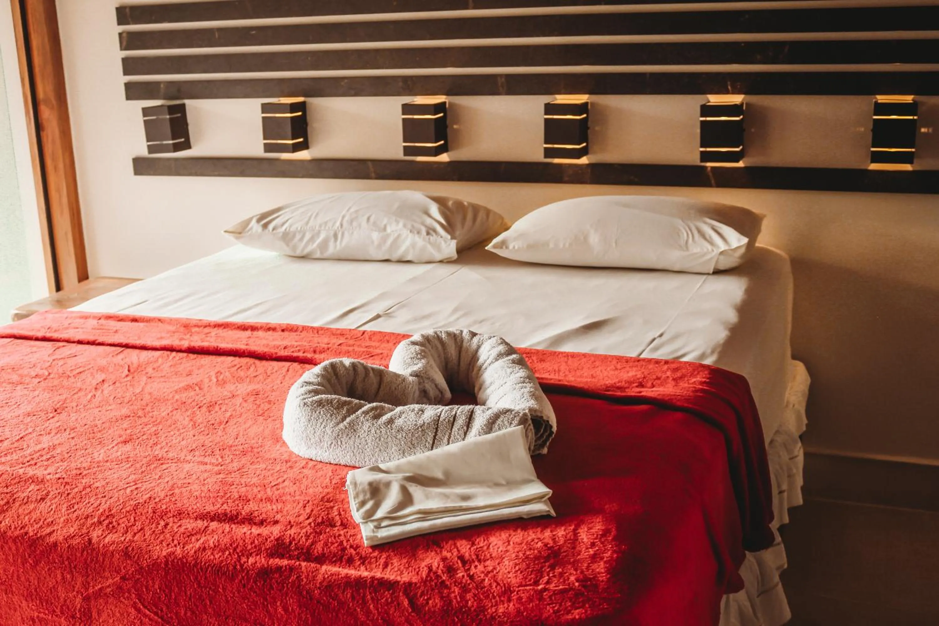 Bed in Pousada Recanto da Concha