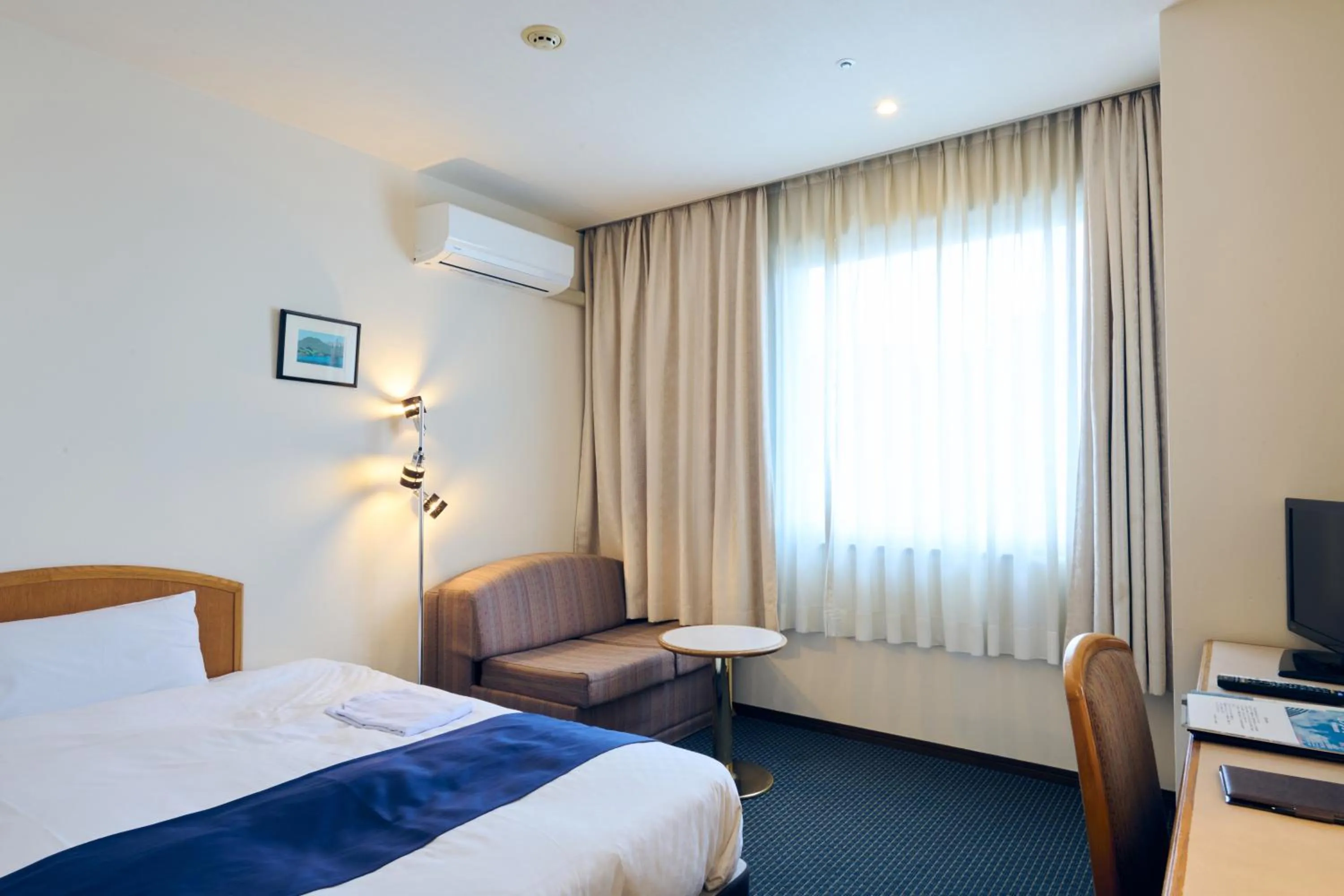 Photo of the whole room, Bed in Hotel Kumamoto Terrsa