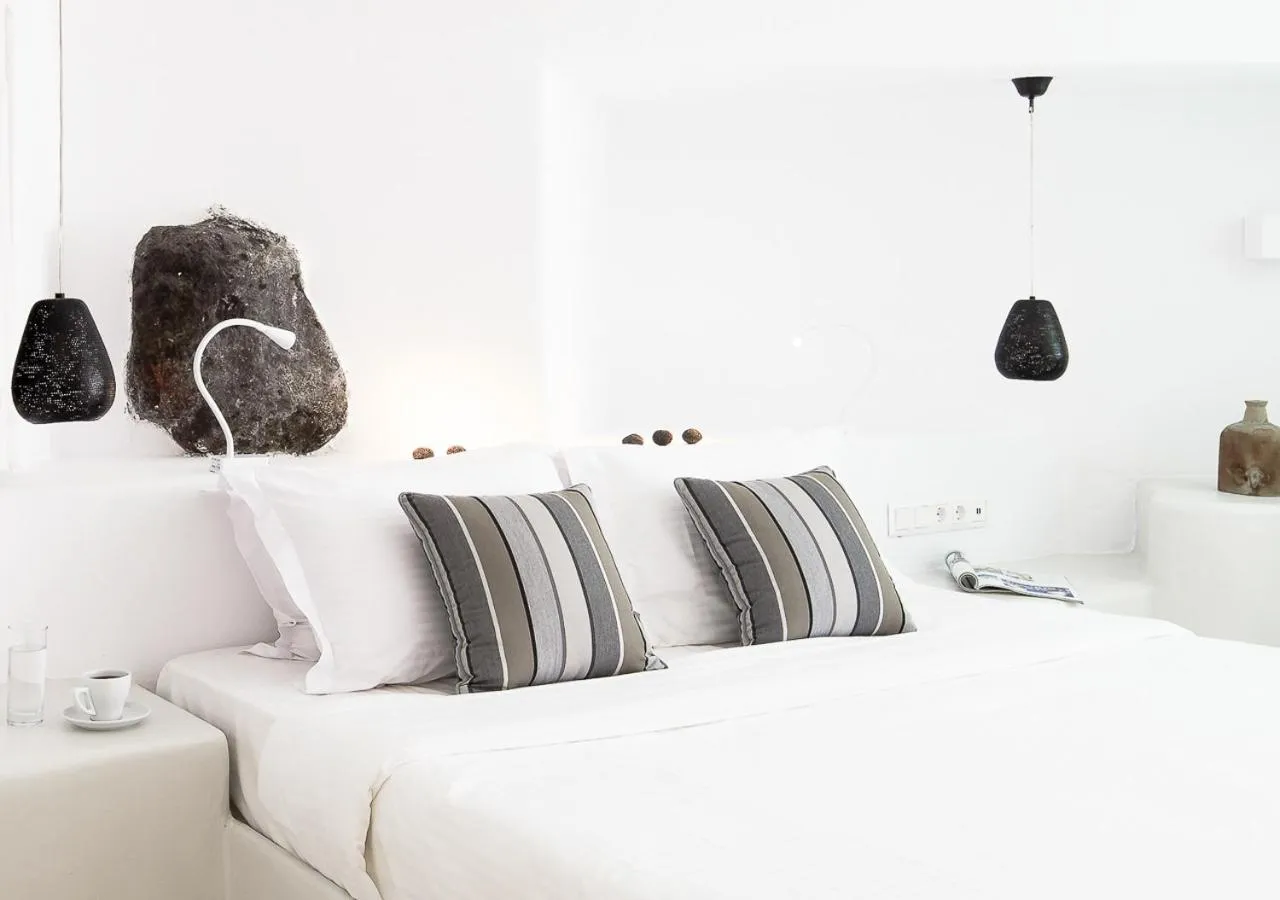 Bed in Dana Villas & Infinity Suites