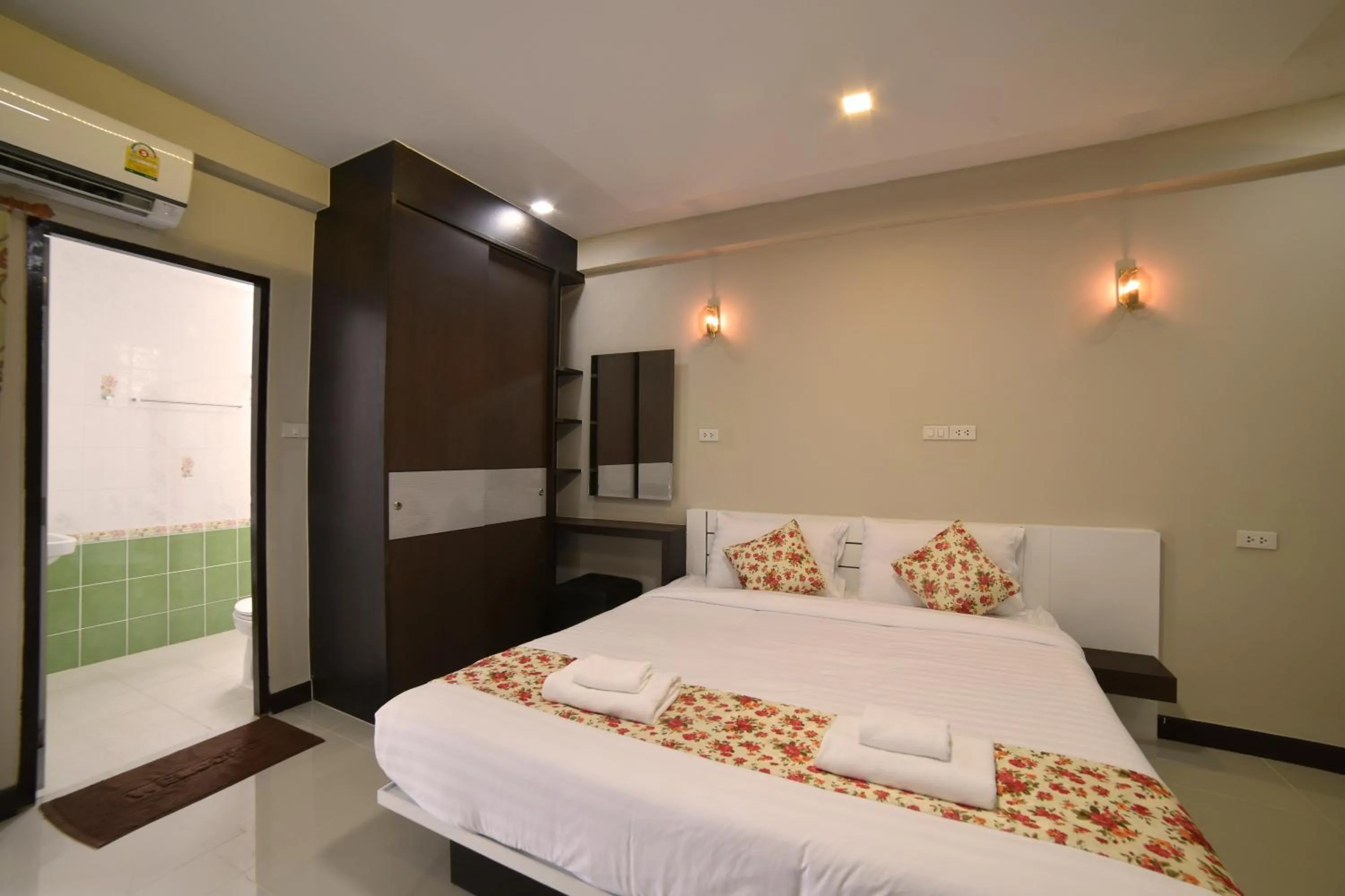 Bed in Gold Airport Suites