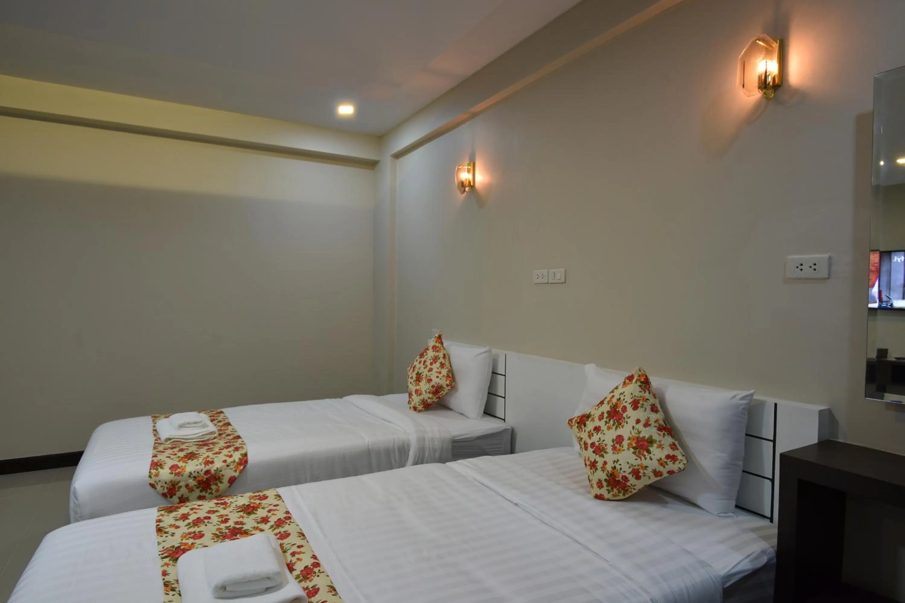 Bed in Gold Airport Suites