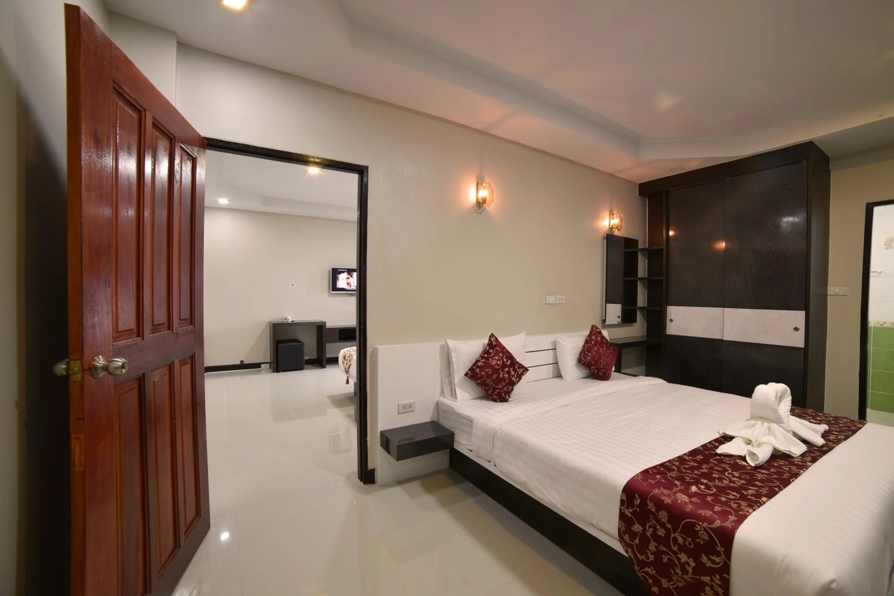 Bed in Gold Airport Suites