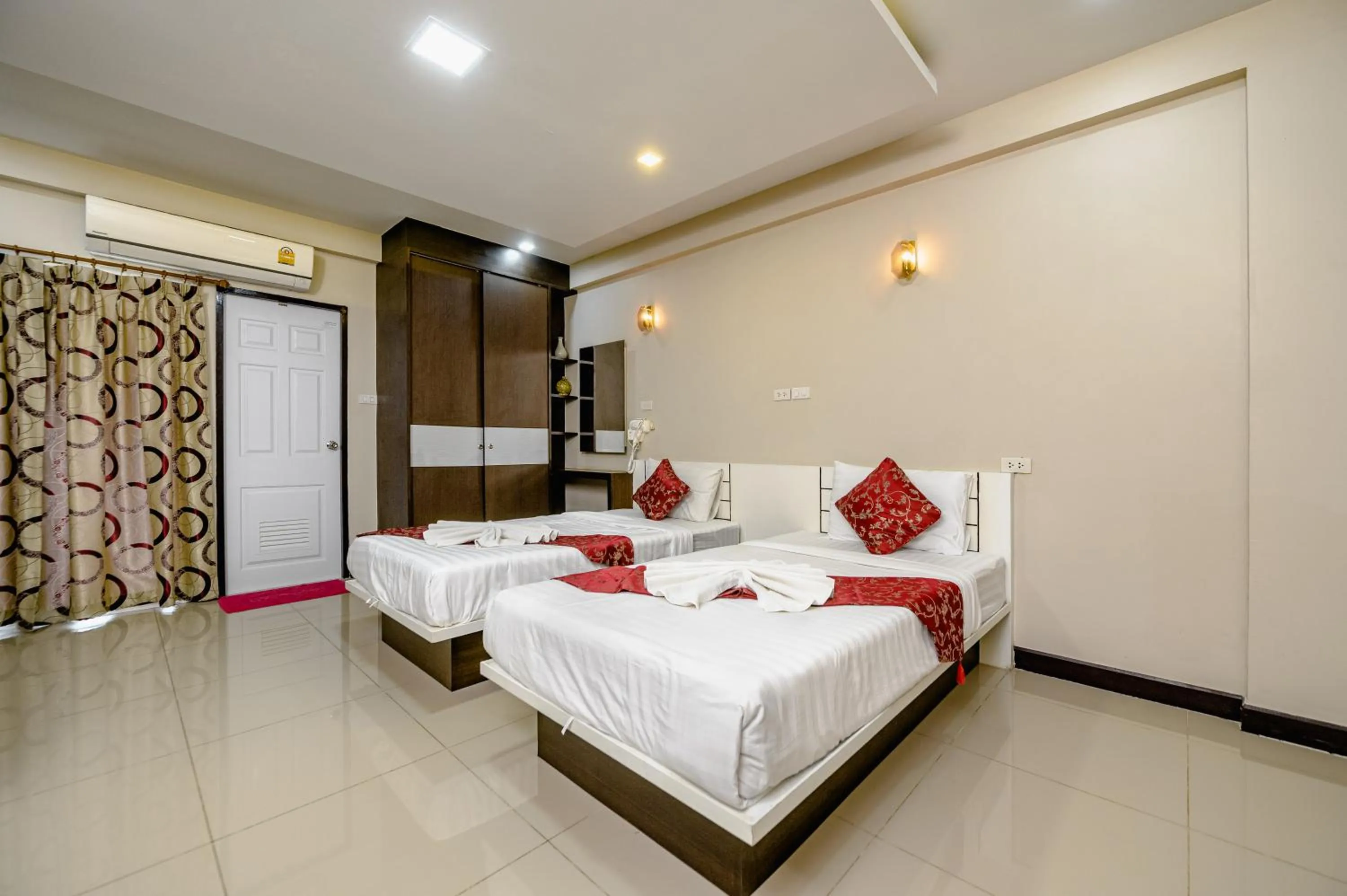 Bed in Gold Airport Suites