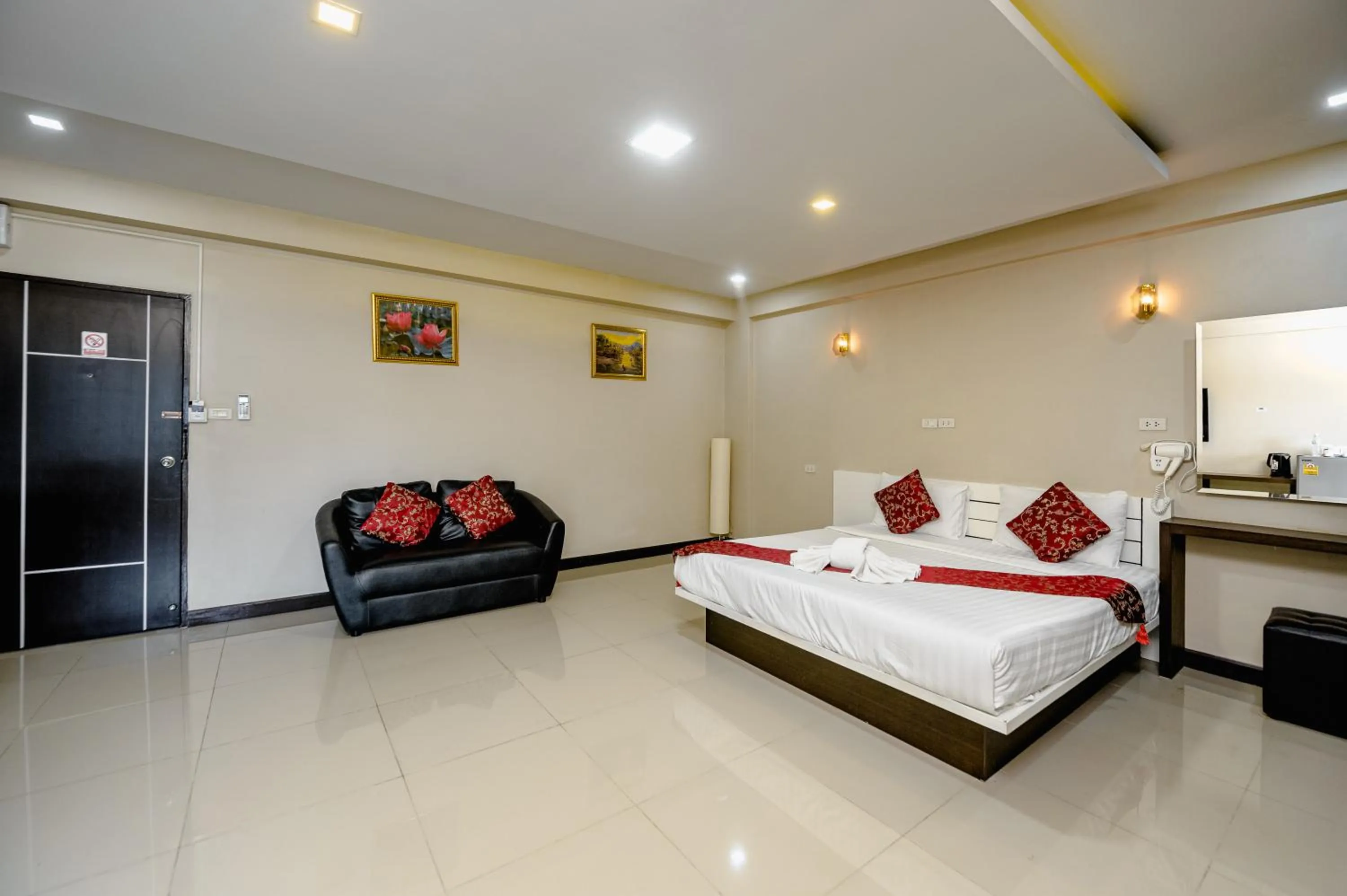 Bed in Gold Airport Suites