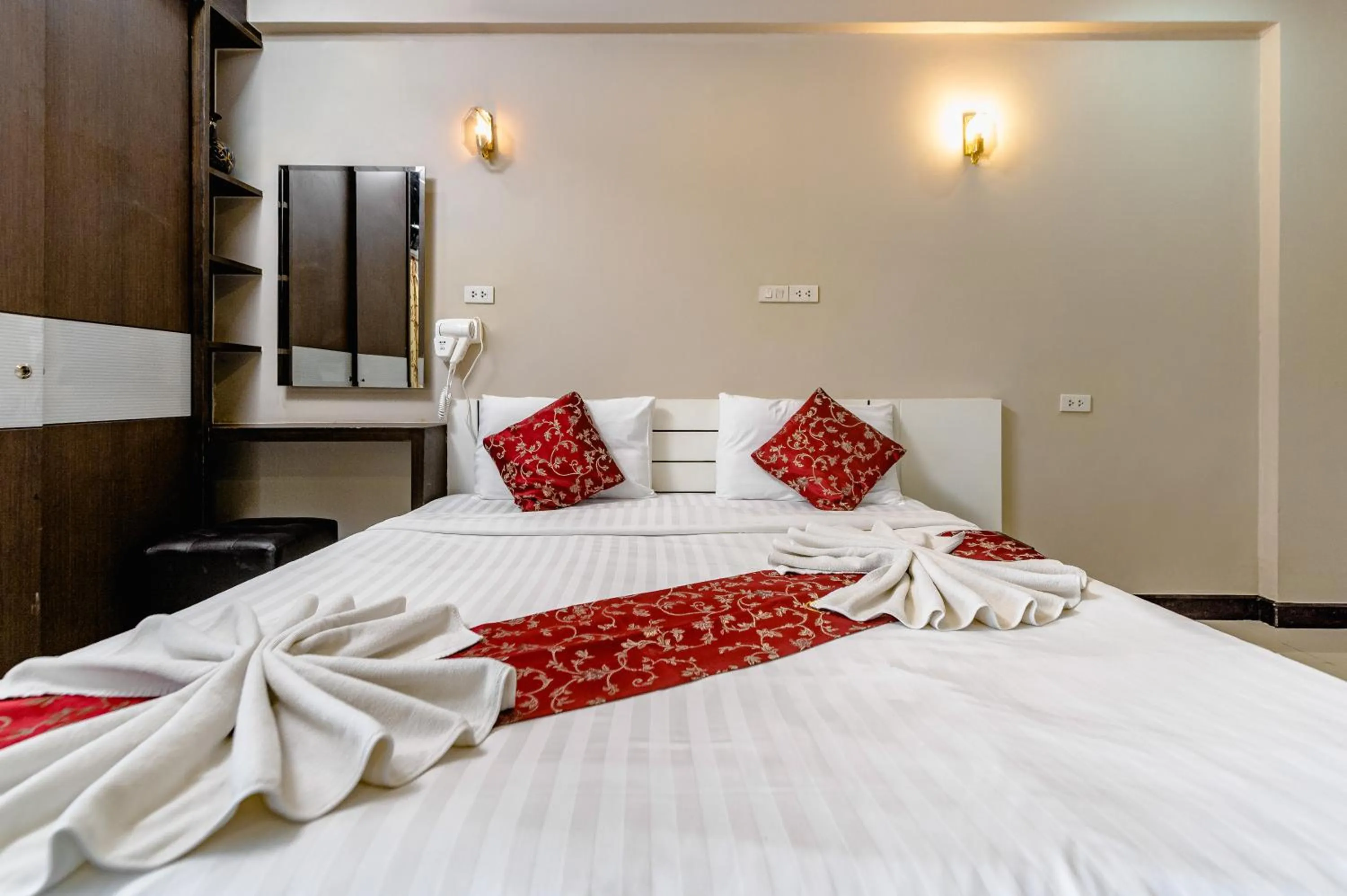 Bed in Gold Airport Suites