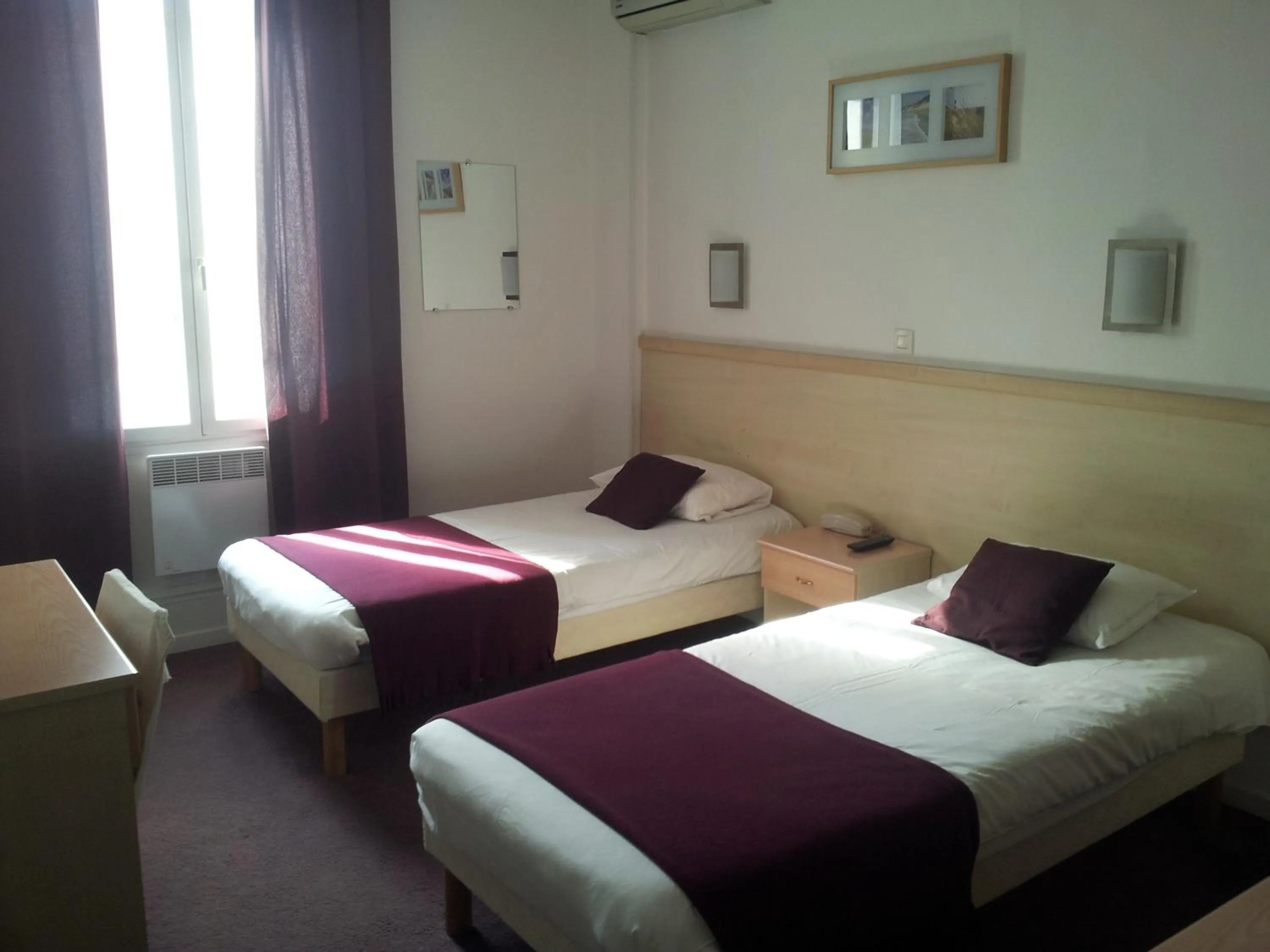 Photo of the whole room, Bed in Hôtel Du Midi