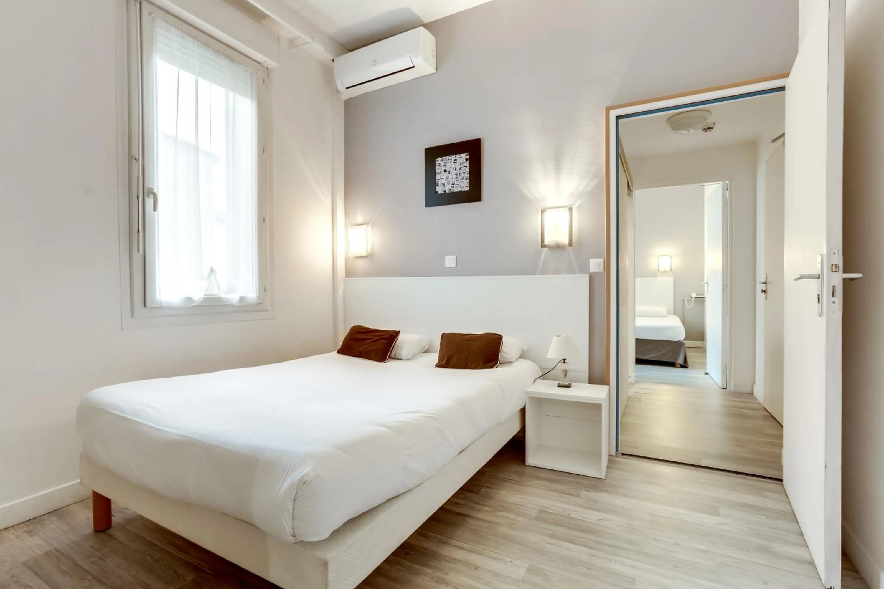 Photo of the whole room, Bed in Hôtel Du Midi